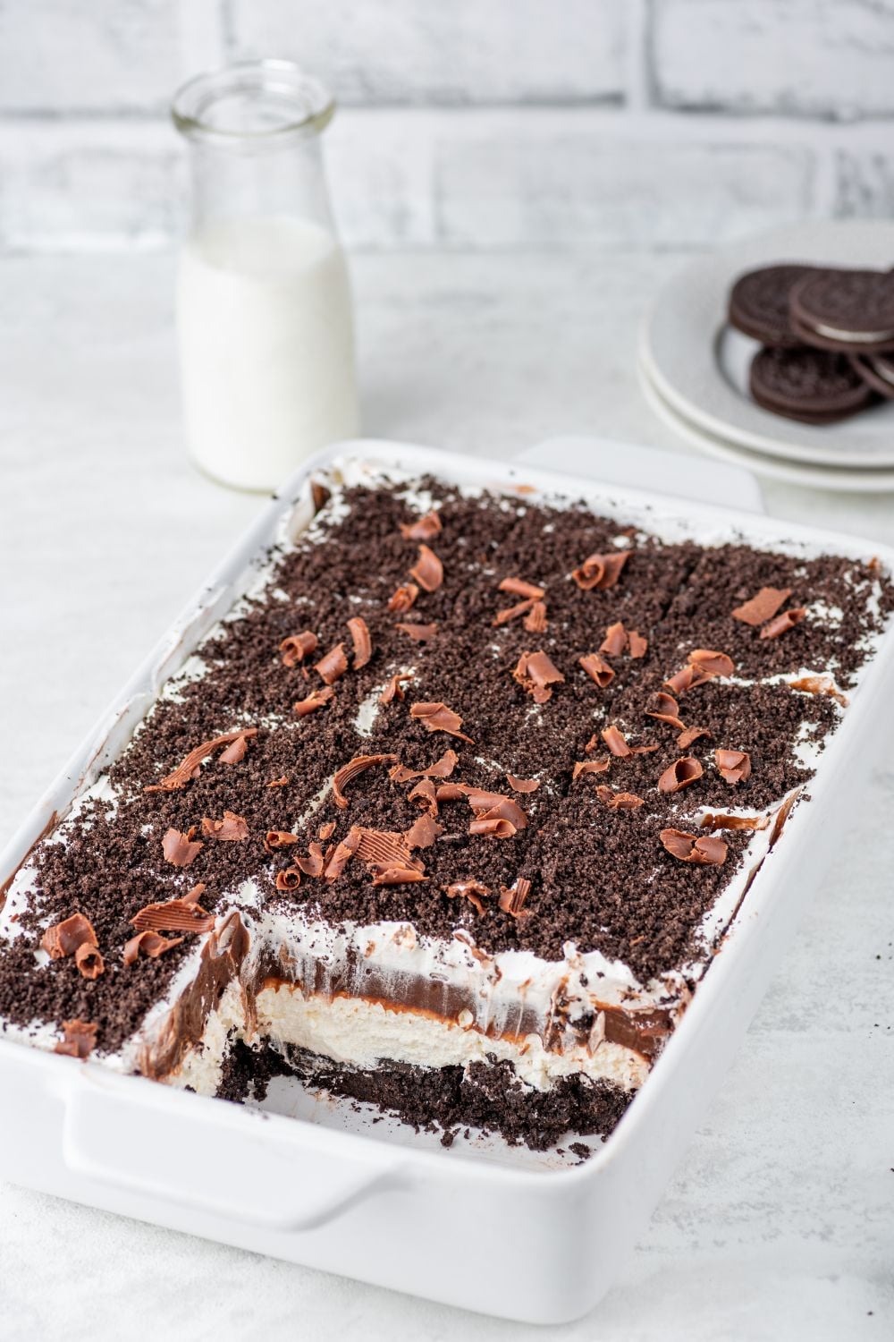 Chocolate Oreo Lush in pan with a few slices taken out of it 