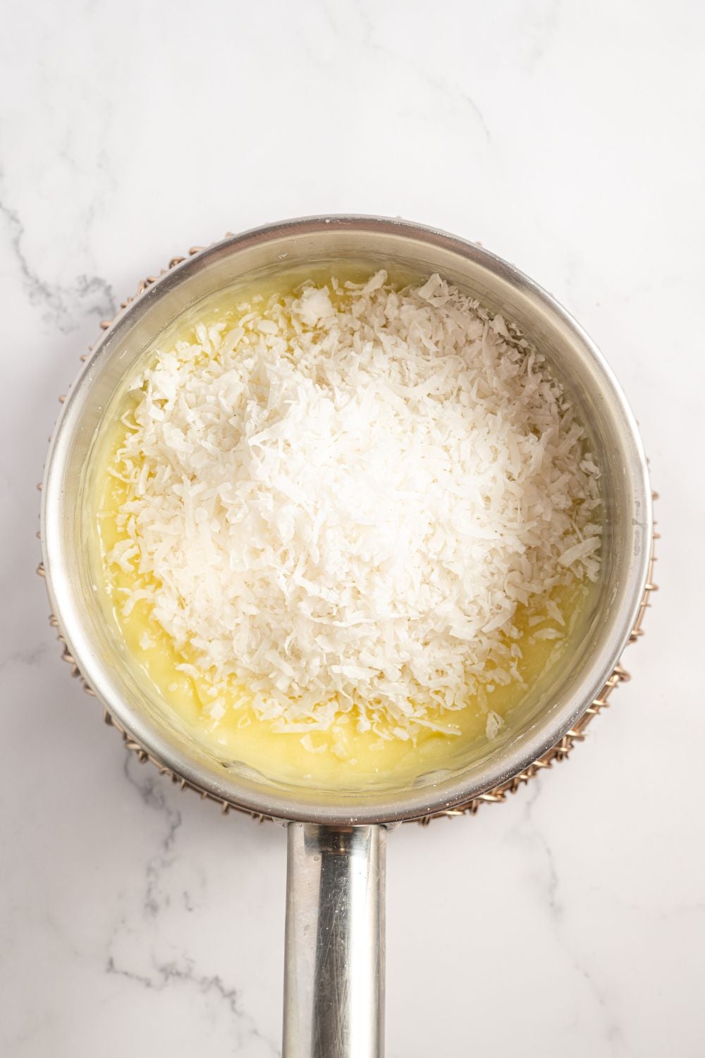 filling for a Coconut Meringue Pie in a saucepan 