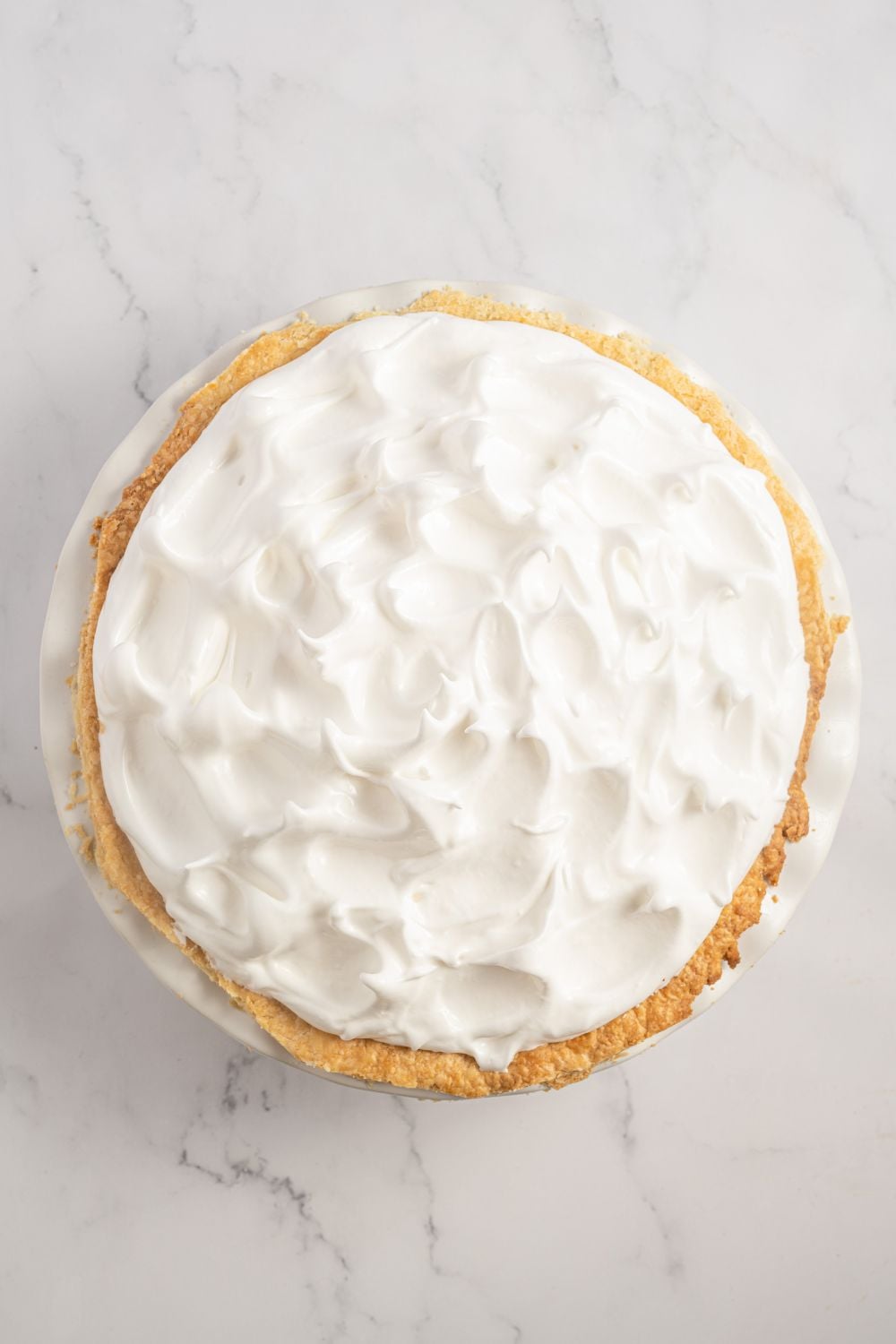 meringue topped Coconut Meringue Pie