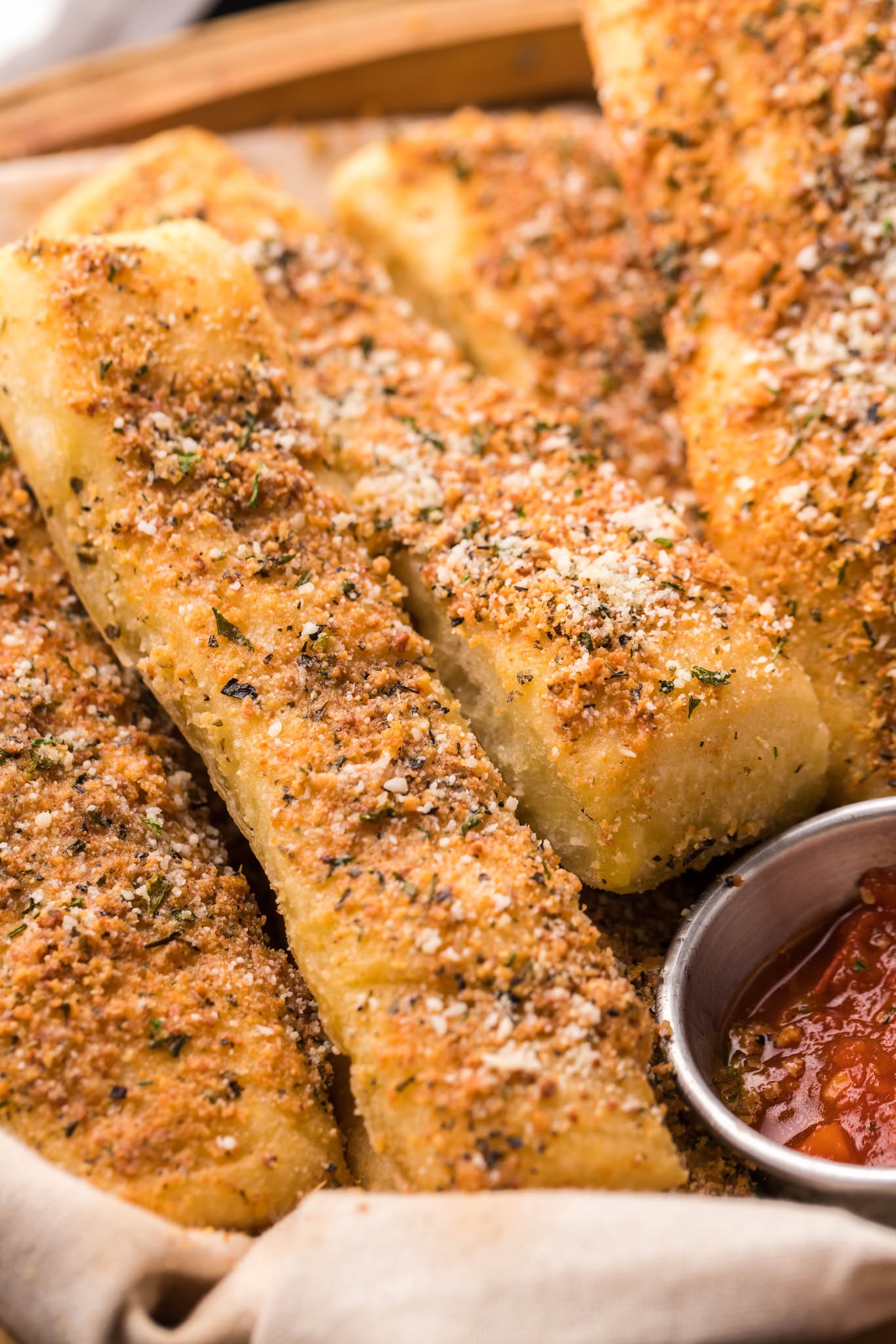 upclose overhead shot of the Copycat Pizza Hut Breadsticks topped with cheese