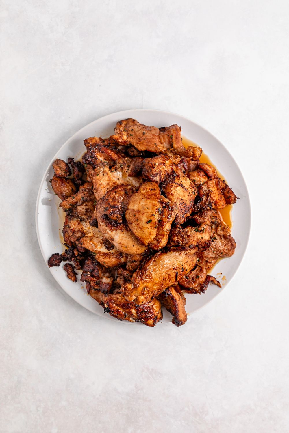 seared Jamaican Brown Stew Chicken on plate