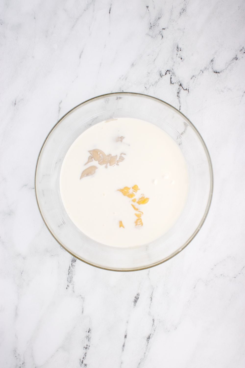 bowl with cream sauce ingredients in it for chicken tetrazzini