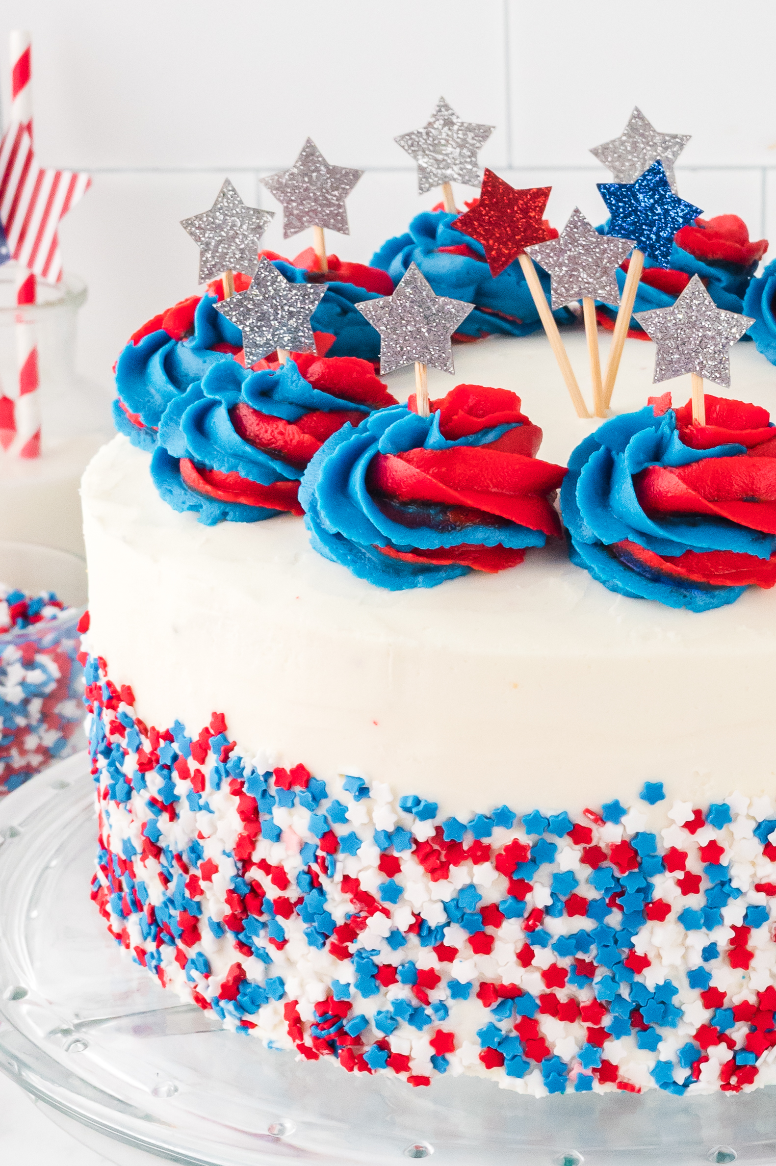 American Flag Layered Cake on a clear cake stand 