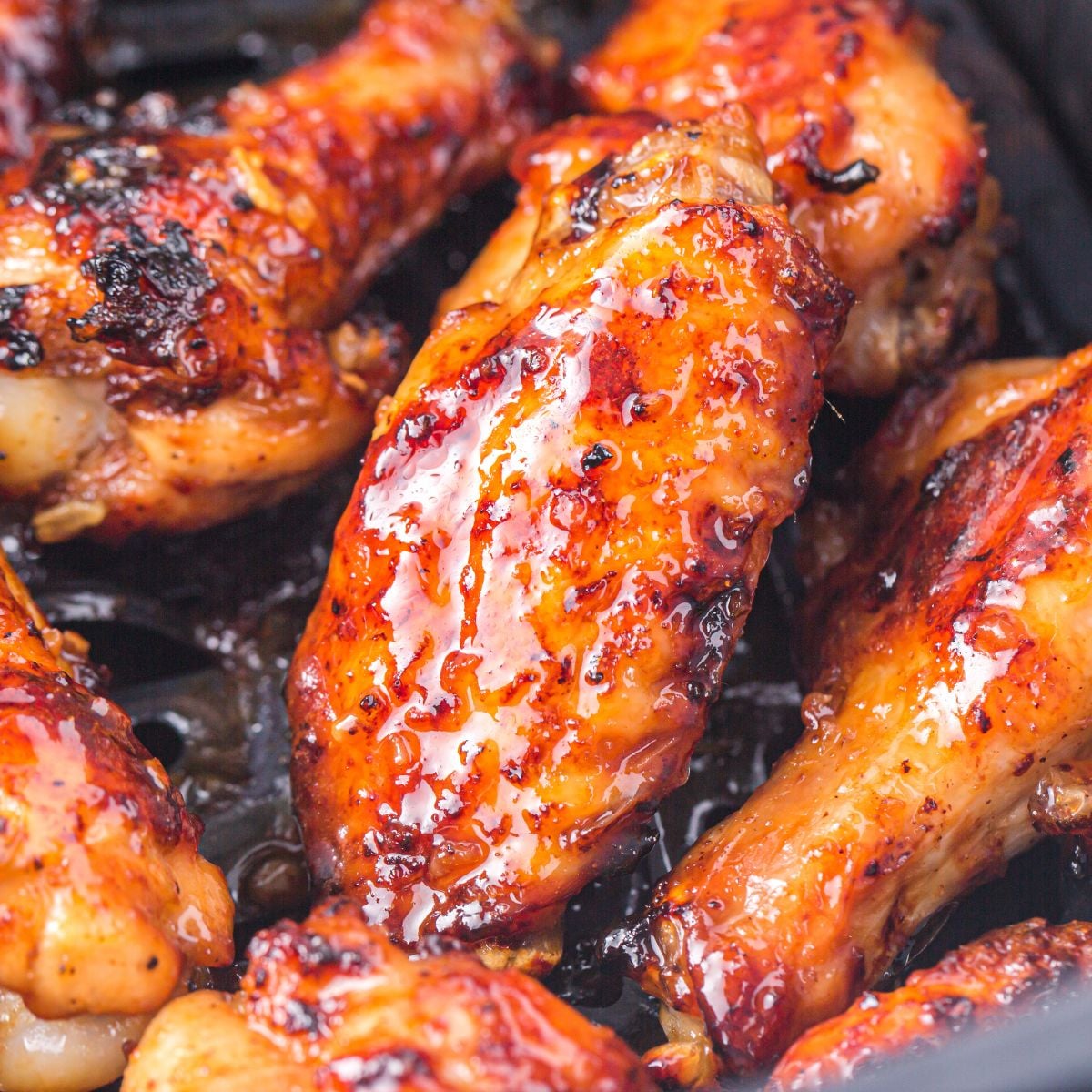 Air Fryer Honey Chicken Wings in an air fryer 