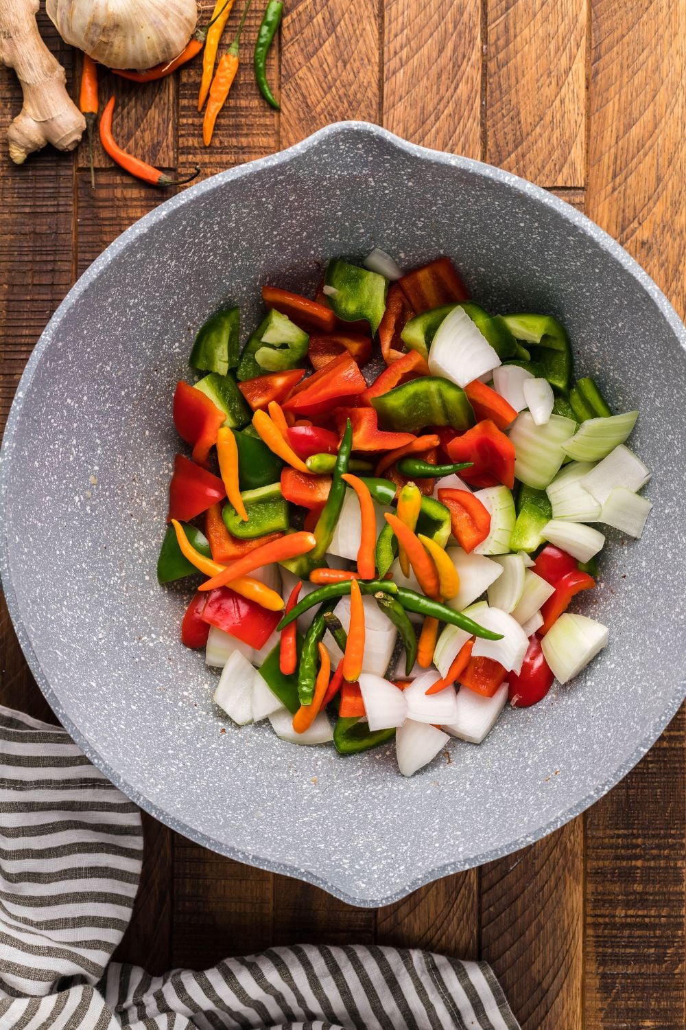 chopped veggies in a bowl on table