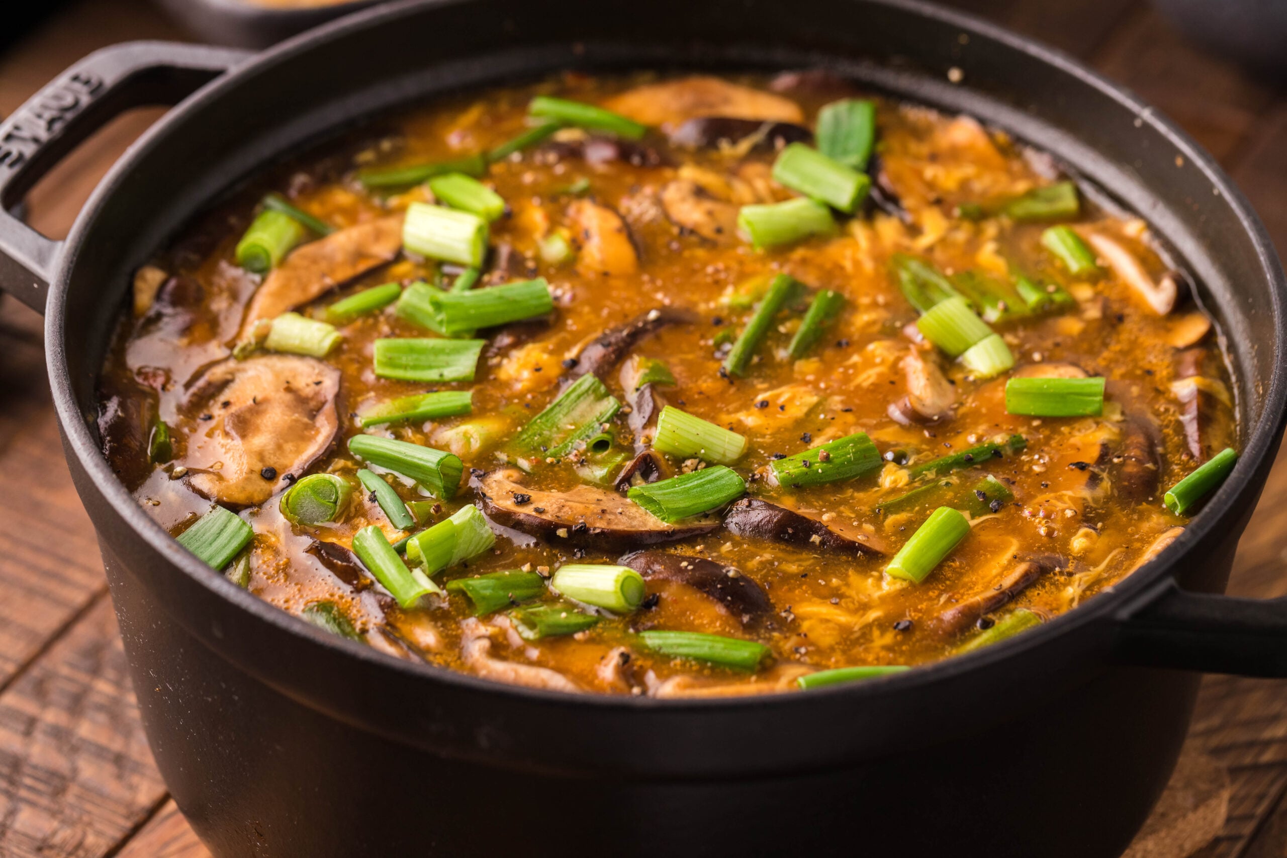 side view of PF Changs Hot And Sour Soup in a big pot