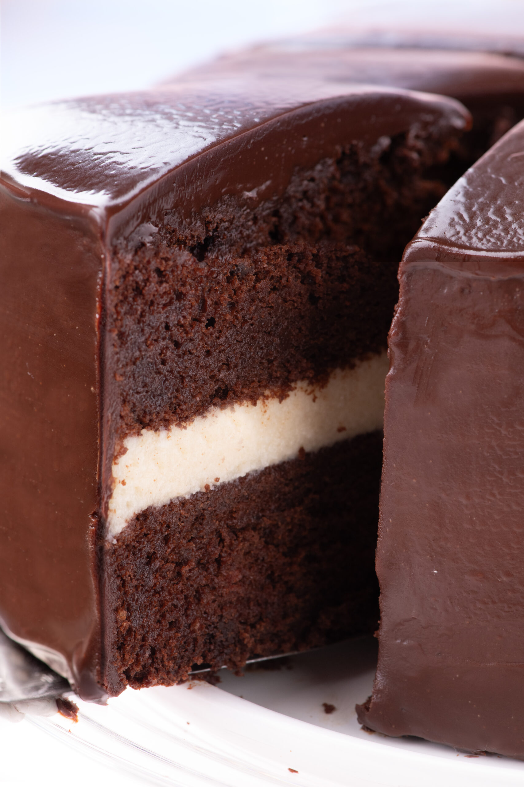 Slice of Ding Dong Cake being removed from the cake