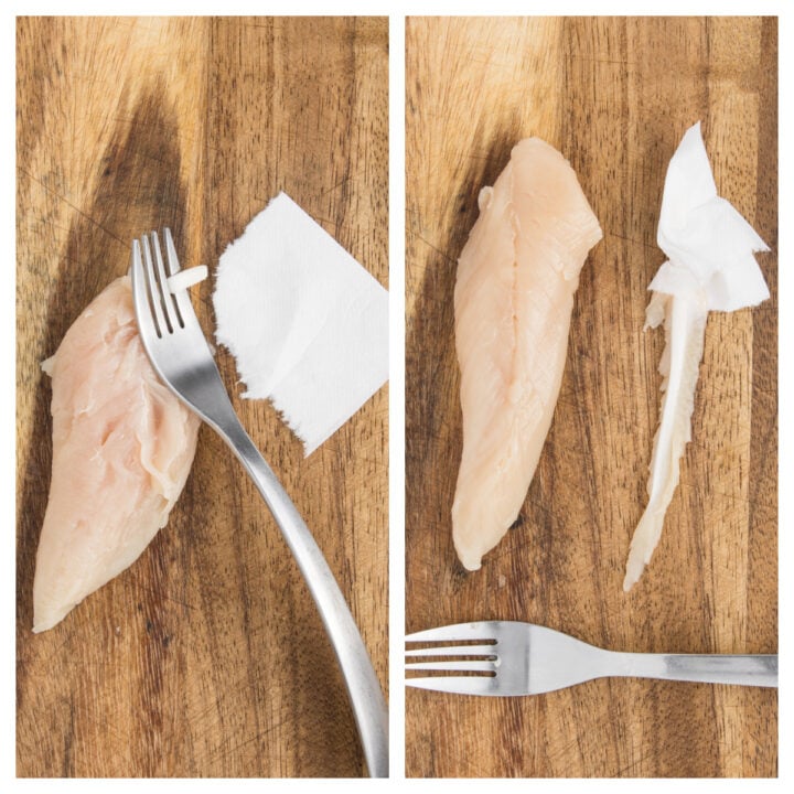 Raw Air Fryer Chicken Tender having the tendon removed with a fork