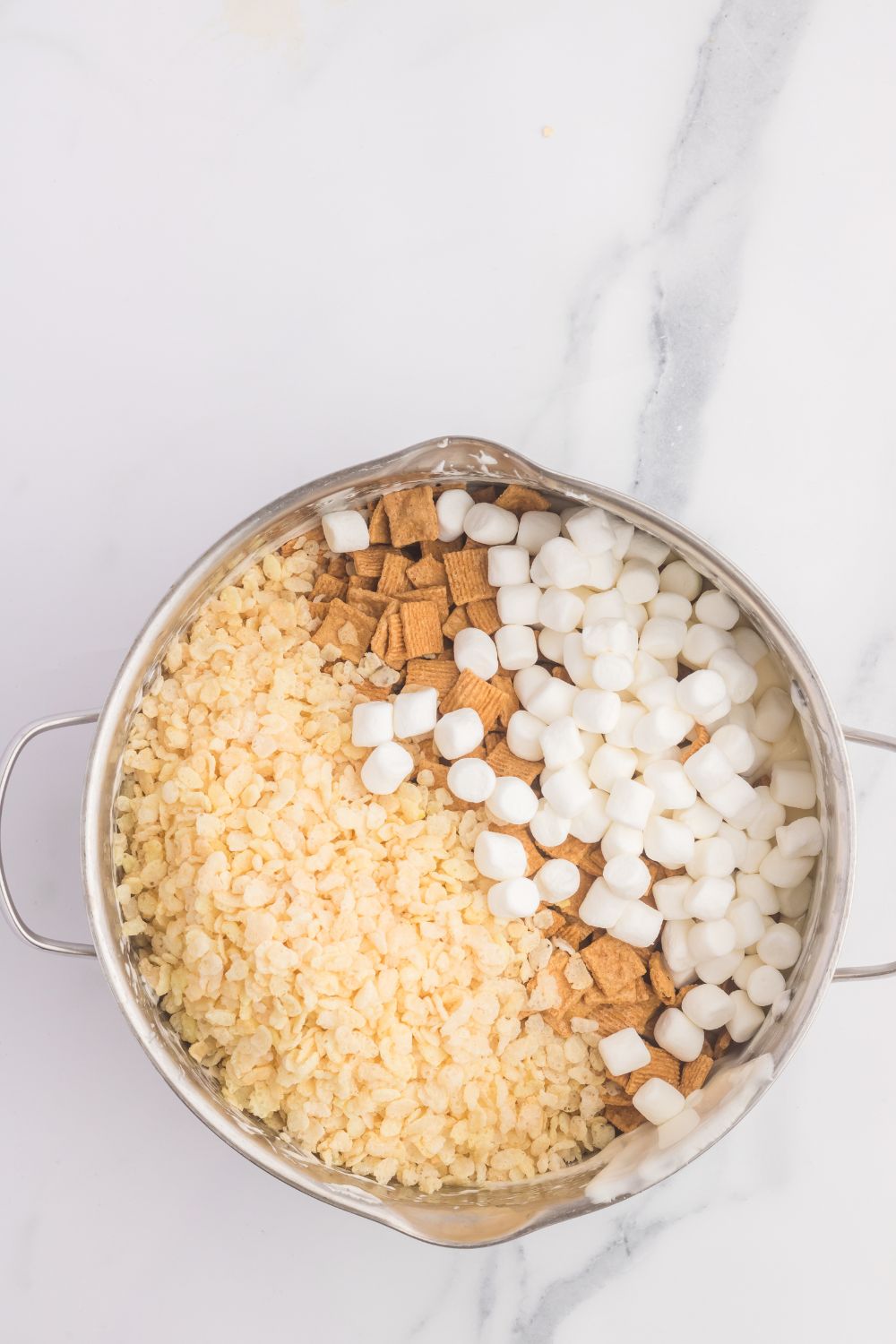 S’mores Rice Krispy mixture poured into a bowl on table