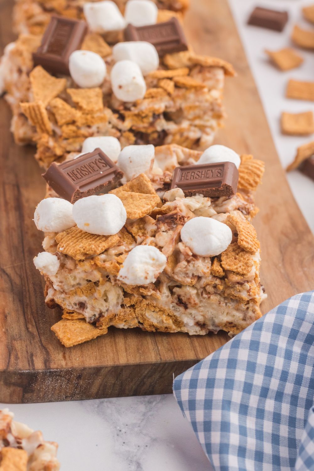S’mores Rice Krispy Treats placed on a wooden table 