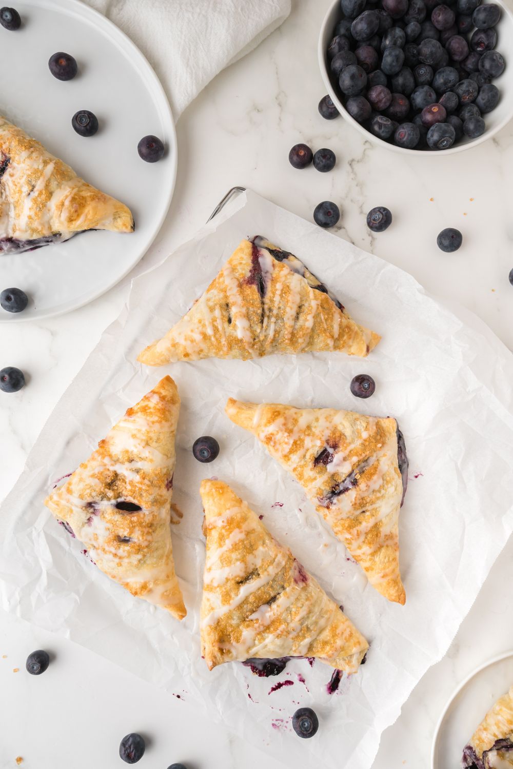 Blueberry Turnovers spread out on table