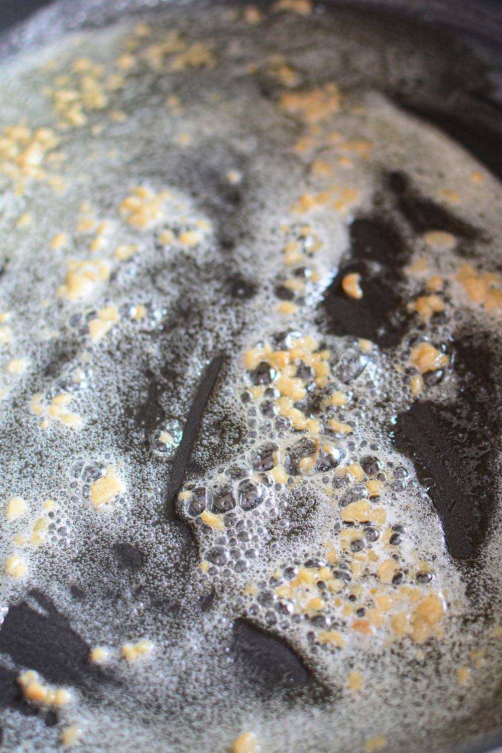butter and garlic sauteed in skillet