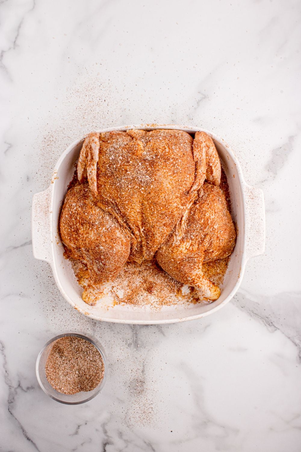 container with seasoned chicken
