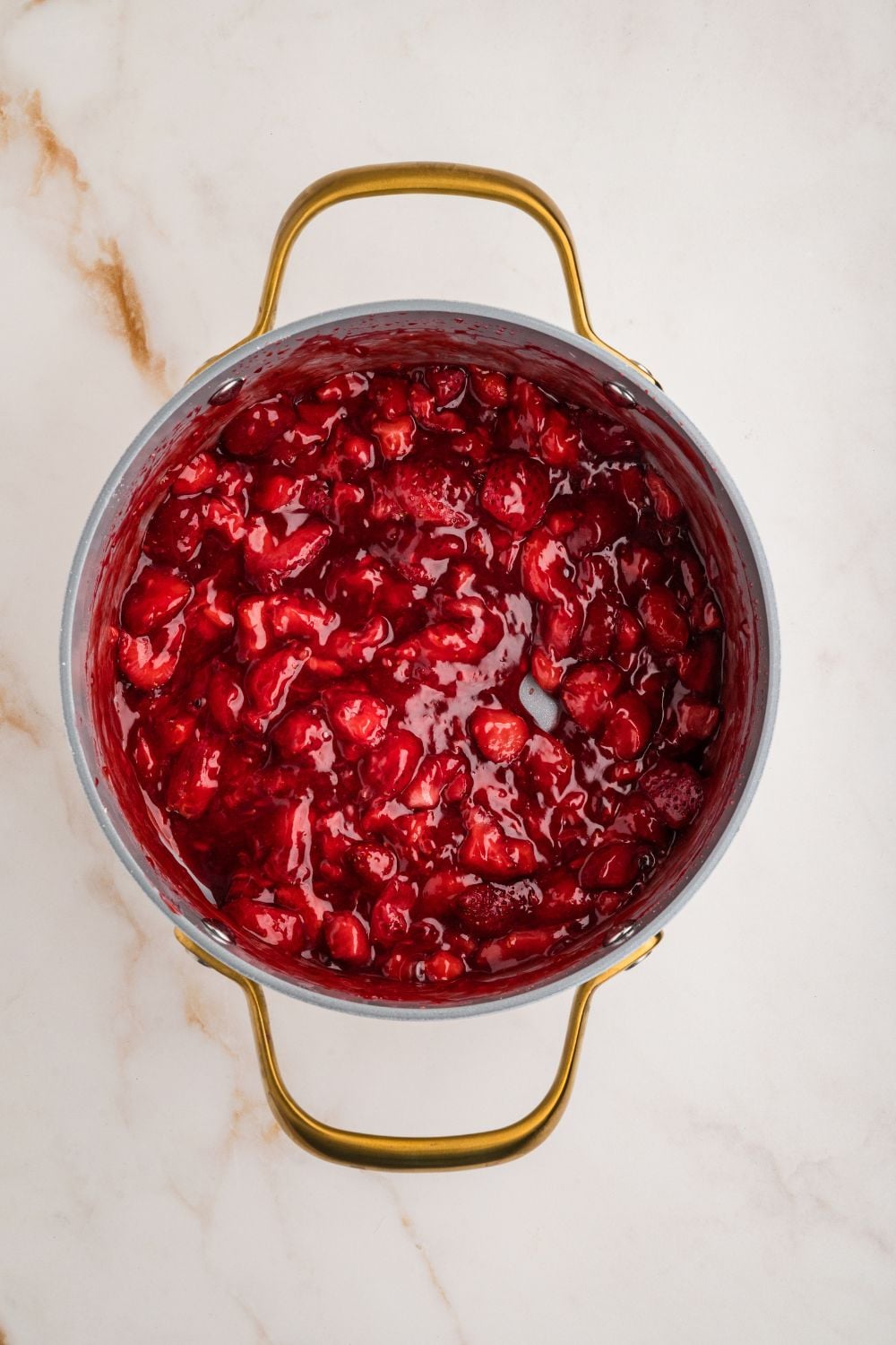 strawberry mixture in a saucepan