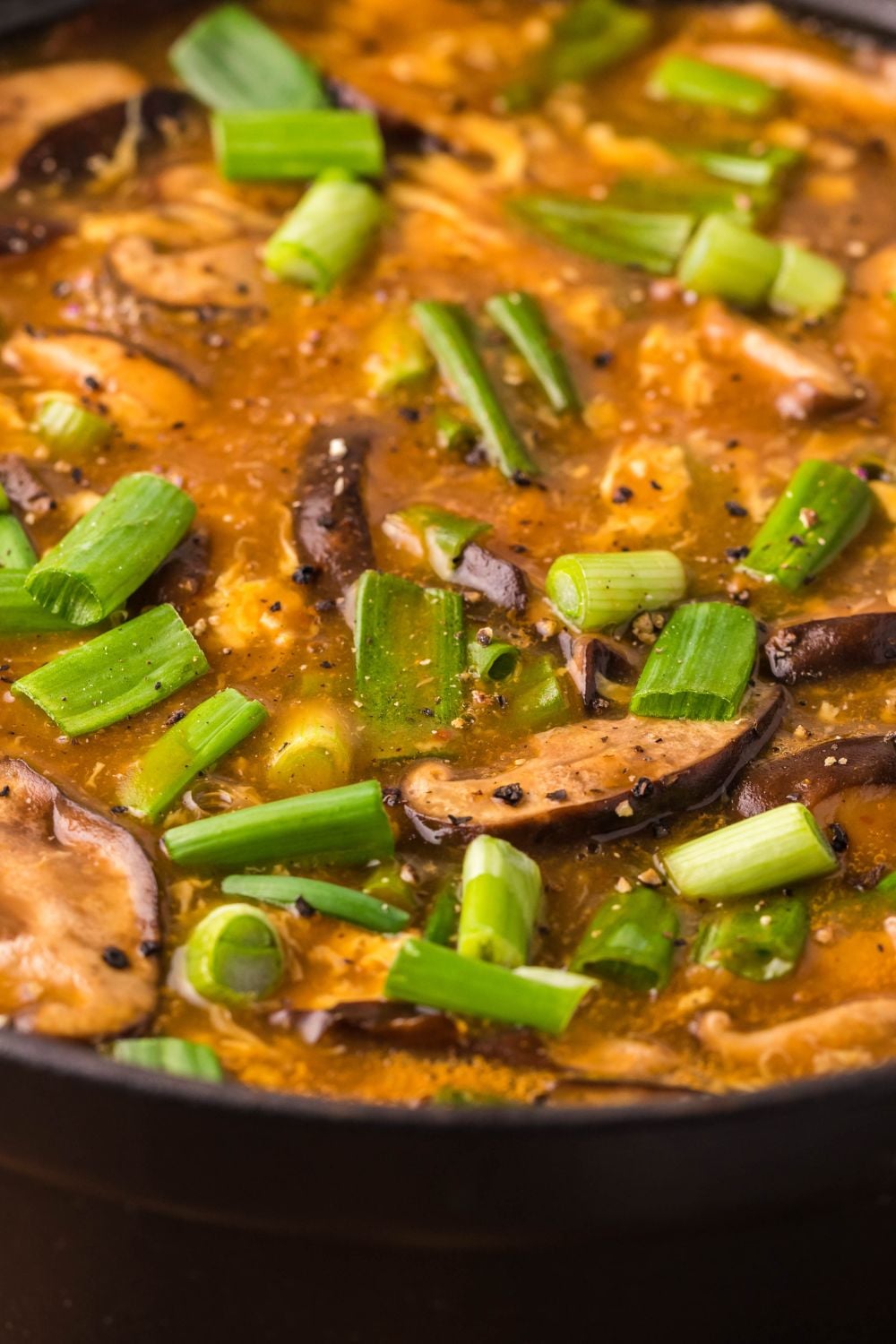 close up of PF Changs Hot And Sour Soup in pan on table