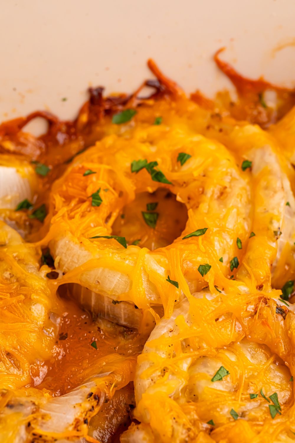 Cheesy Tennessee Onions baked up till golden brown in pan