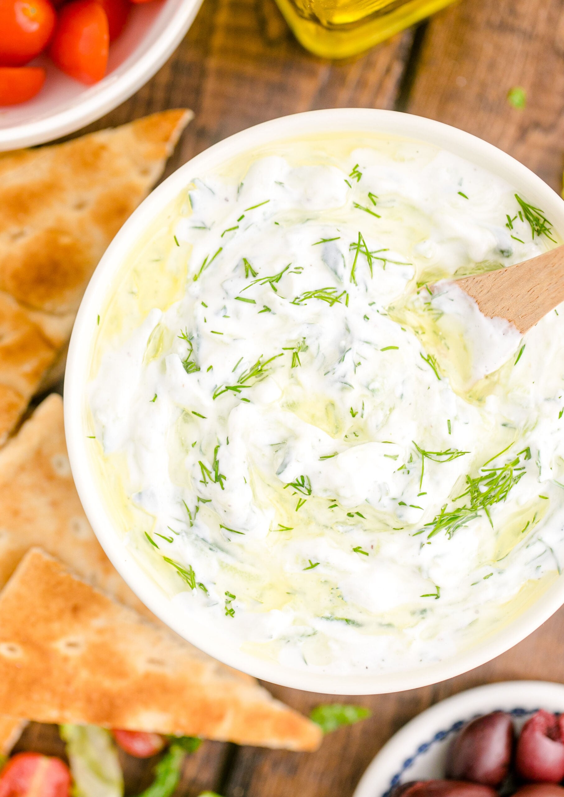 overhead shot of the Tzatziki Sauce in a white and blue bowl