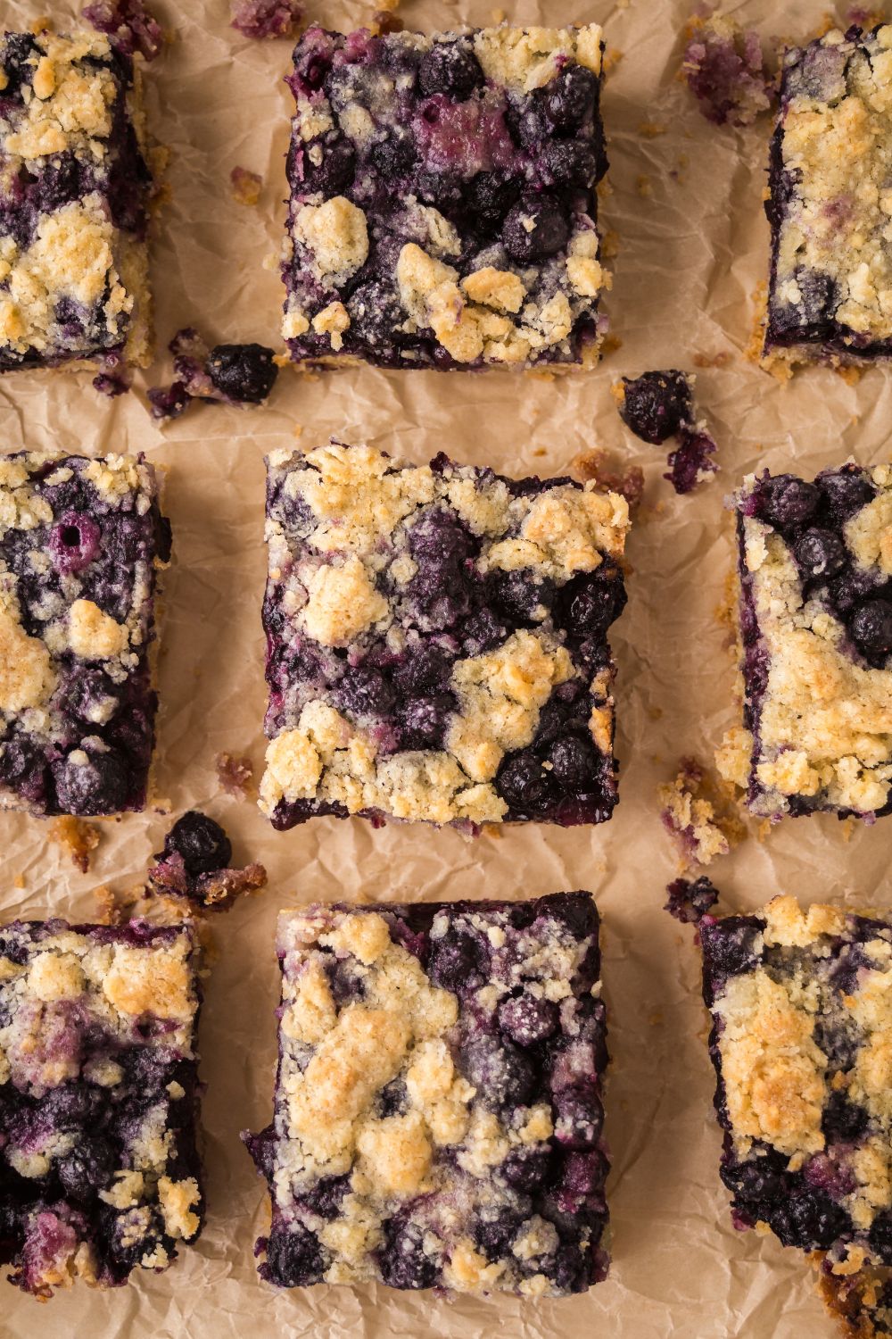 Blueberry Crumb Bars cut and placed on table in squares