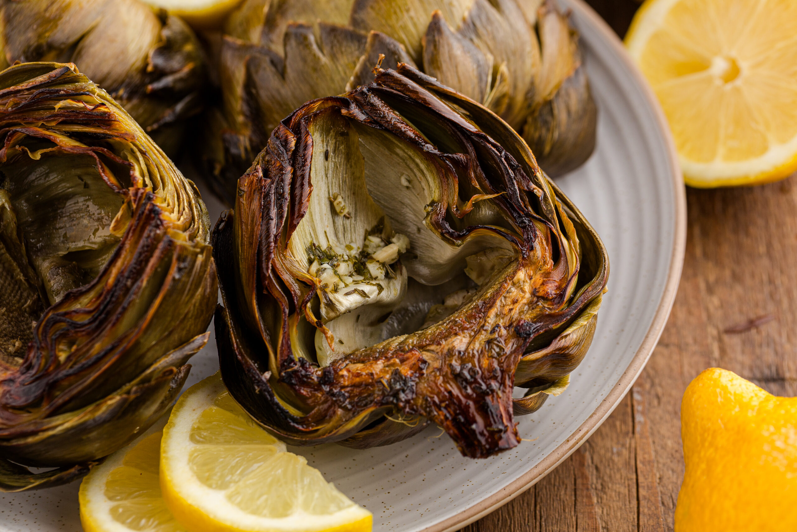 view of inside of a roasted artichoke on a baking sheet