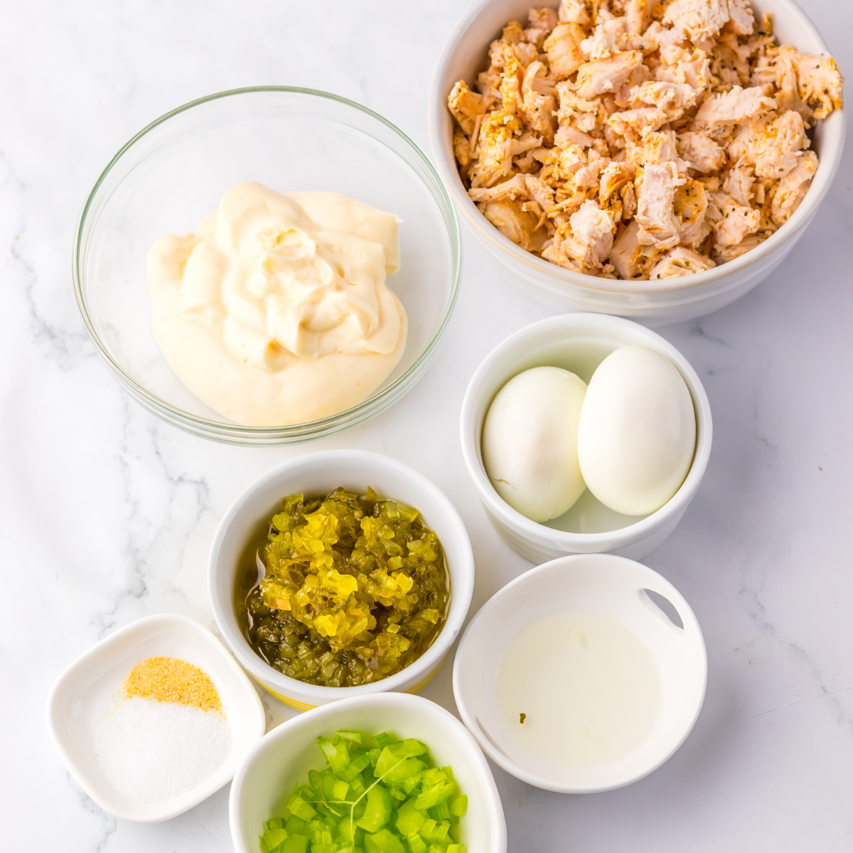 Overhead shot of the ingredients needed to make this chicken salad recipe. 