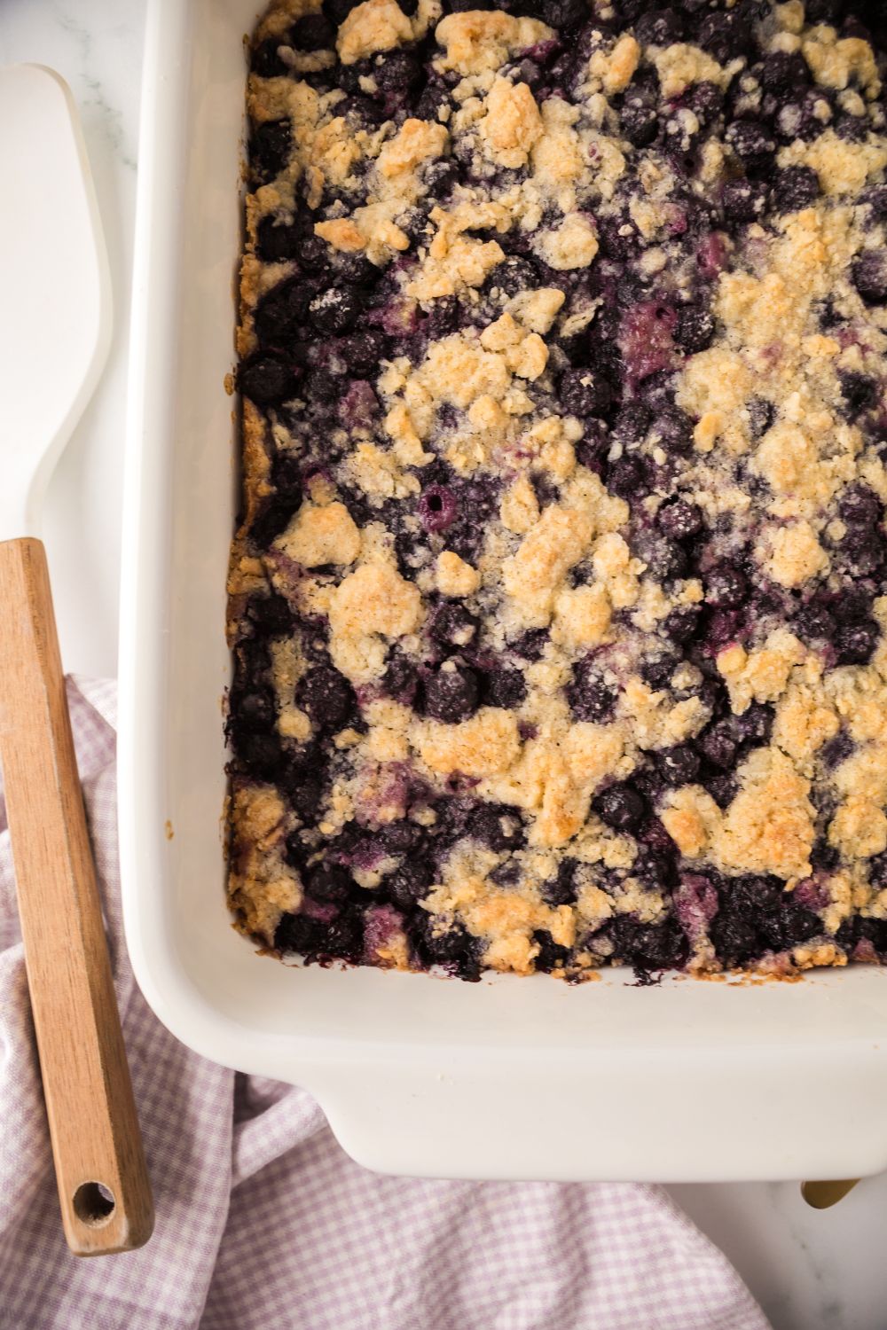 Blueberry Crumb Bars in a casserole dish on table