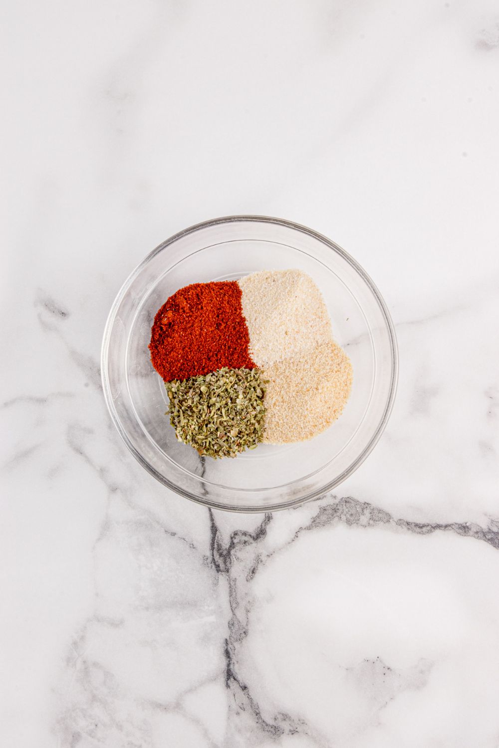 spices in a glass bowl on table 