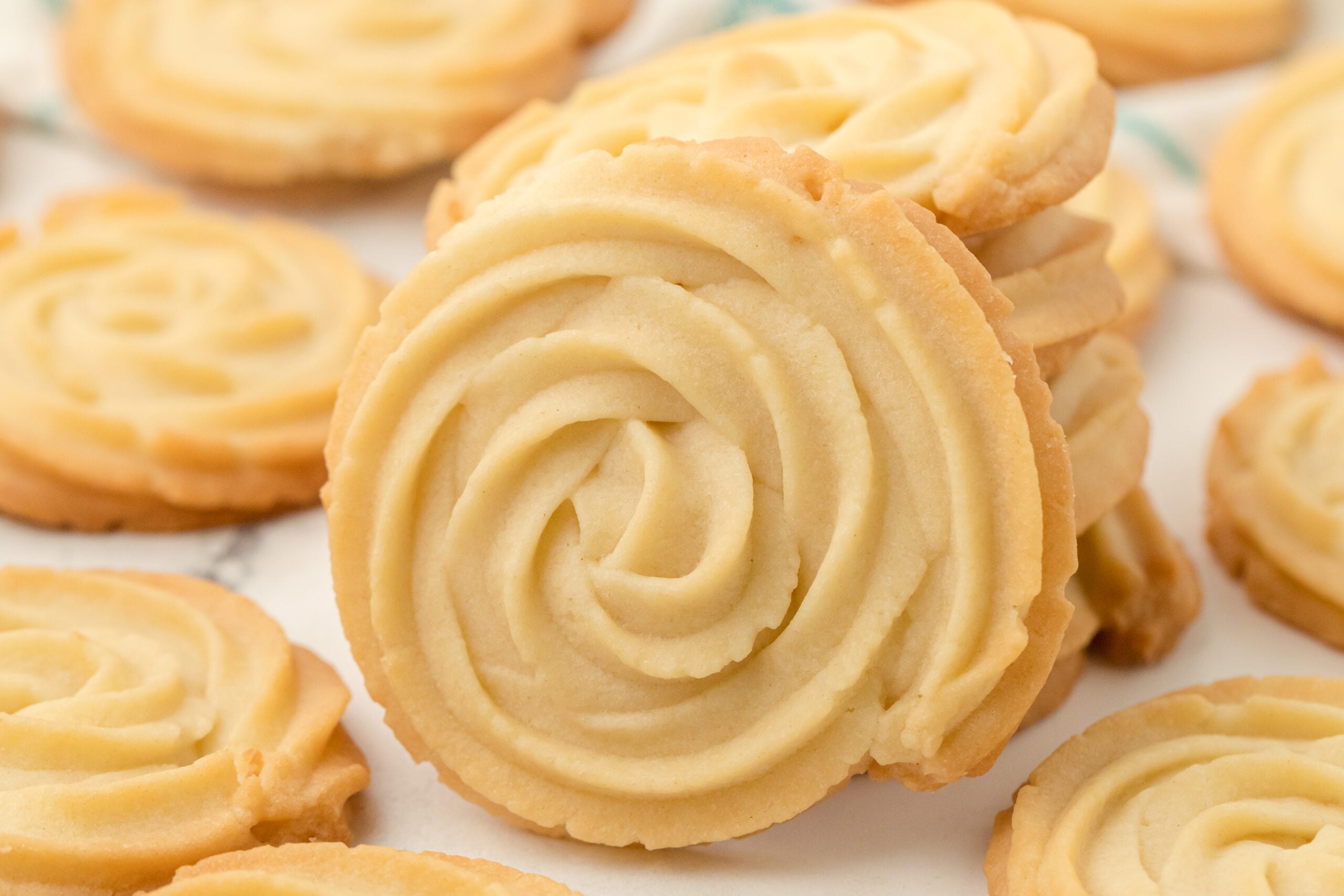 close up shot of the 3 Ingredient Butter Cookies on a white marble table