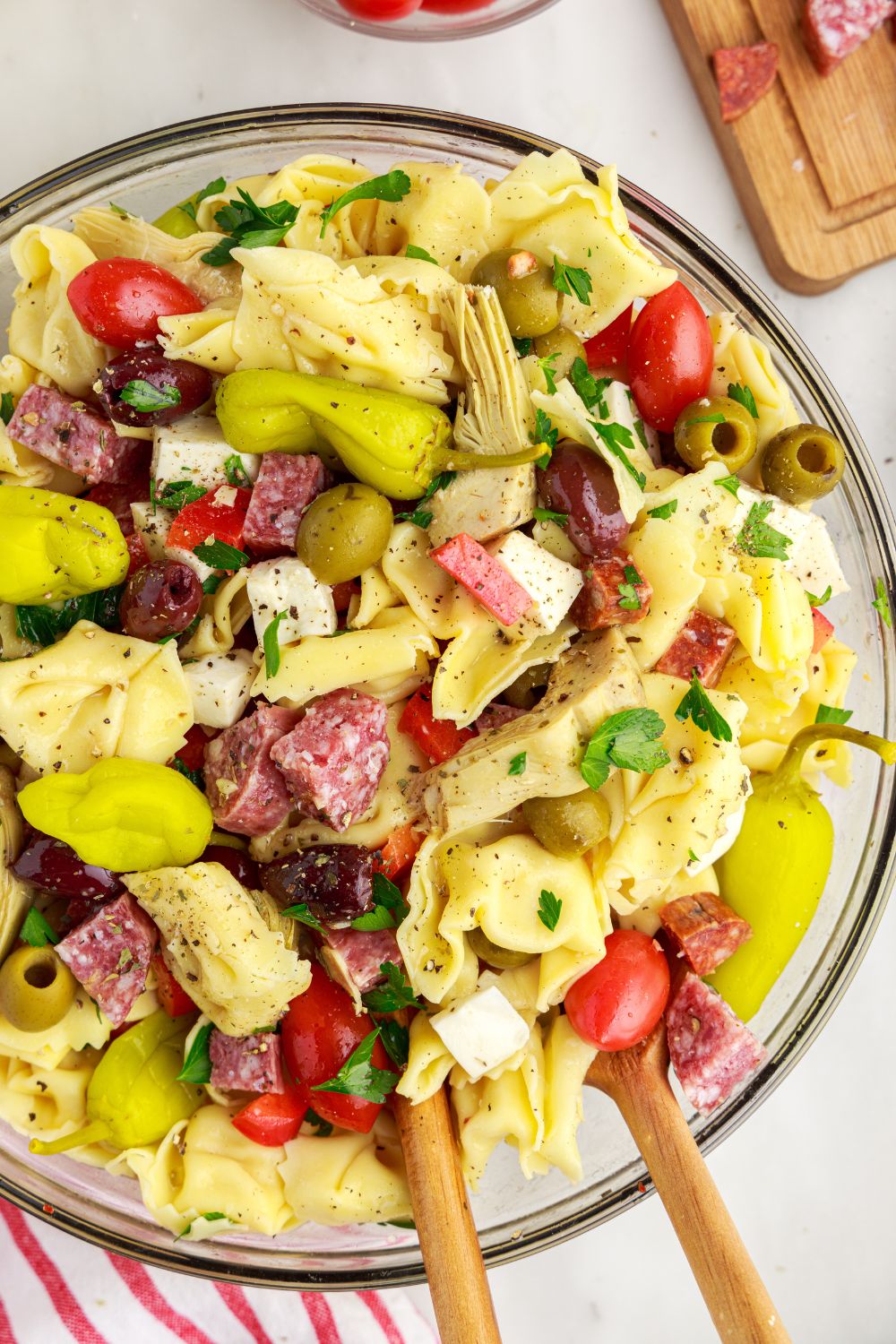 Antipasto Tortellini Pasta Salad in a bowl that is fully mixed up 
