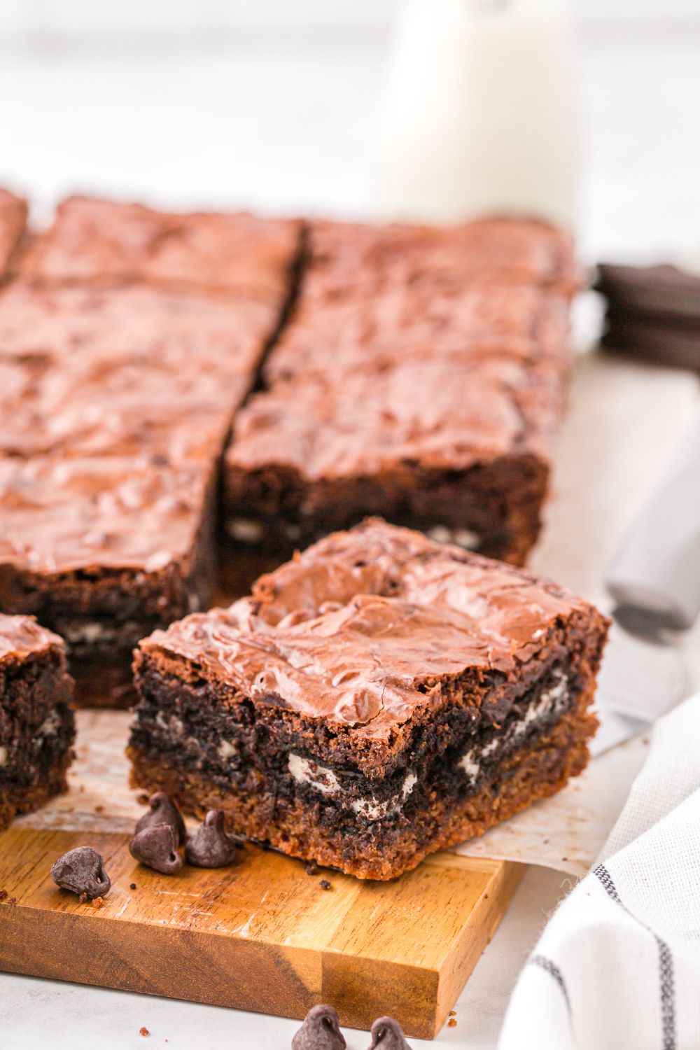 Slutty Brownies sliced in squares with Oreo cookies in the center 