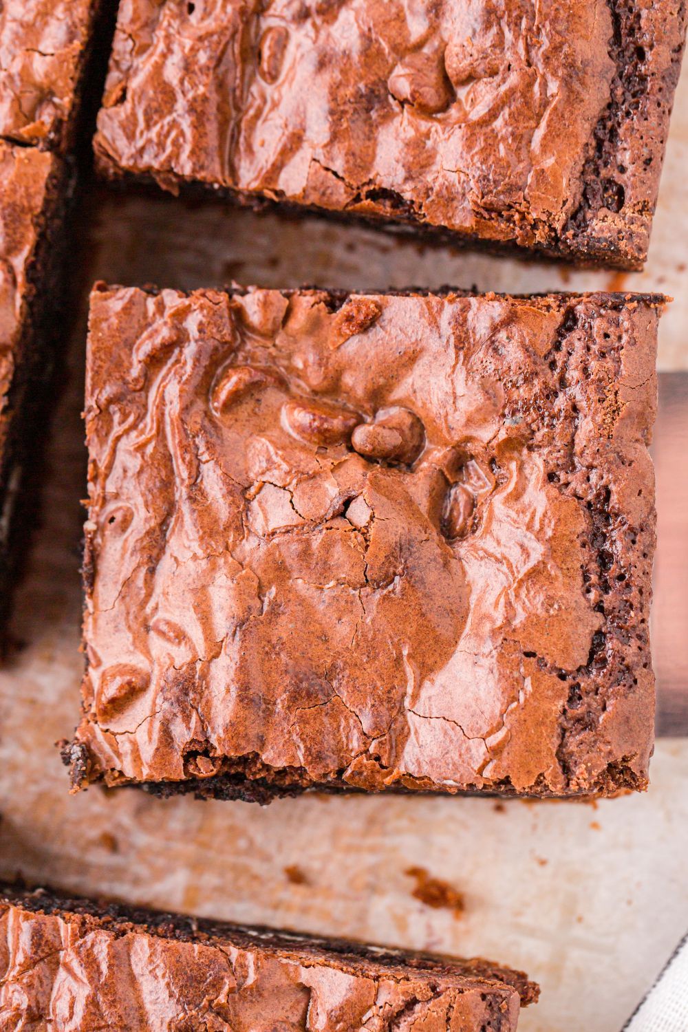 Slutty Brownies sliced in squares and placed on cutting board 