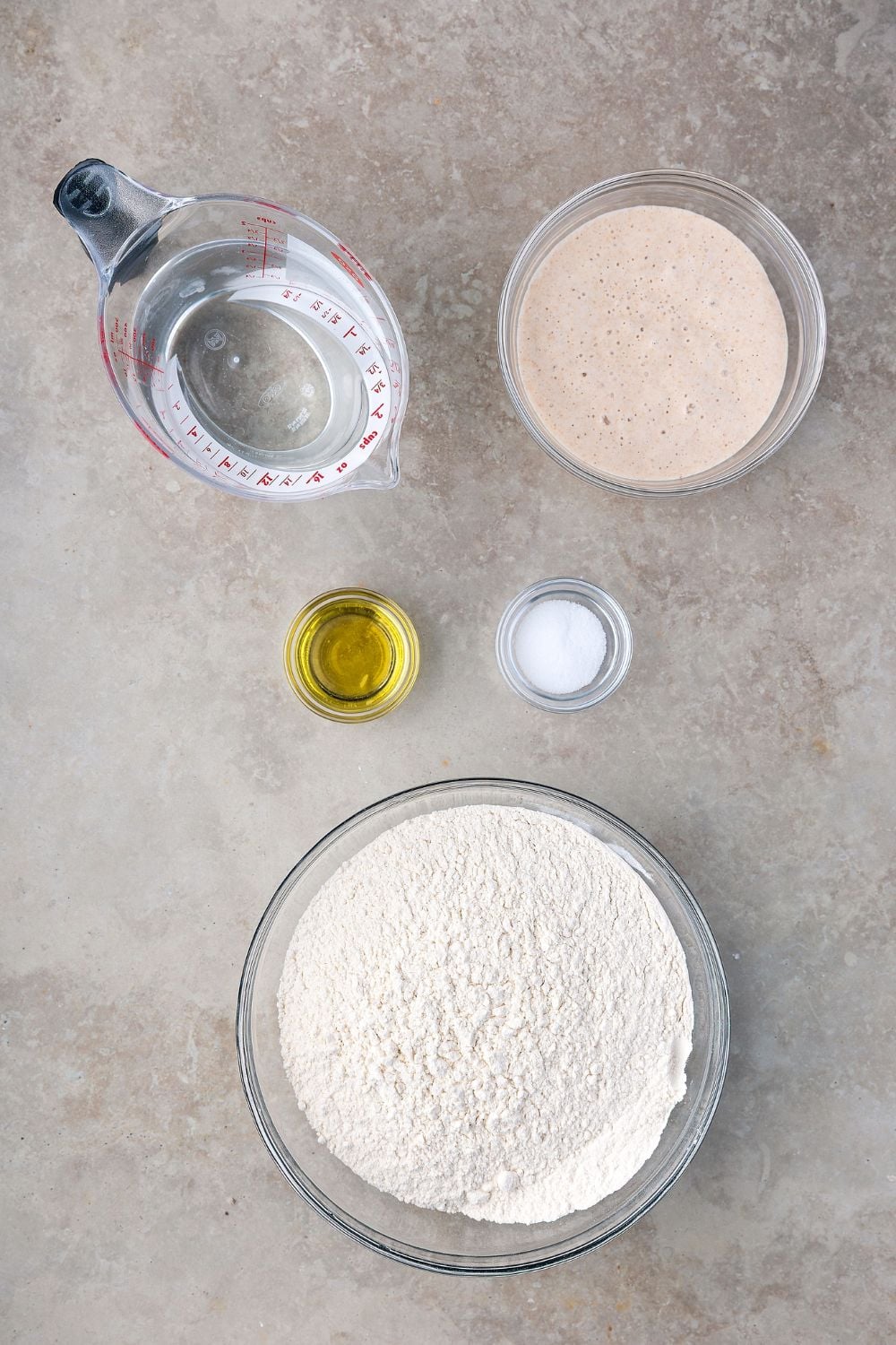 ingredients for Homemade Sourdough Bread in single serve bowls on counter 