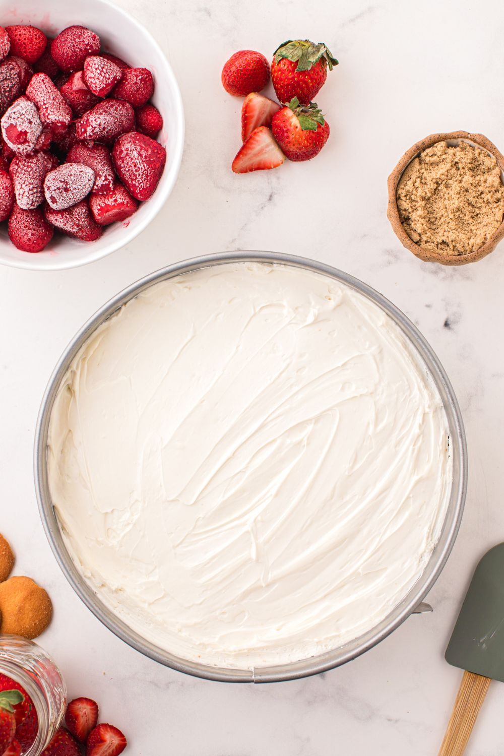 No Bake Cheesecake spread out in a pan on table