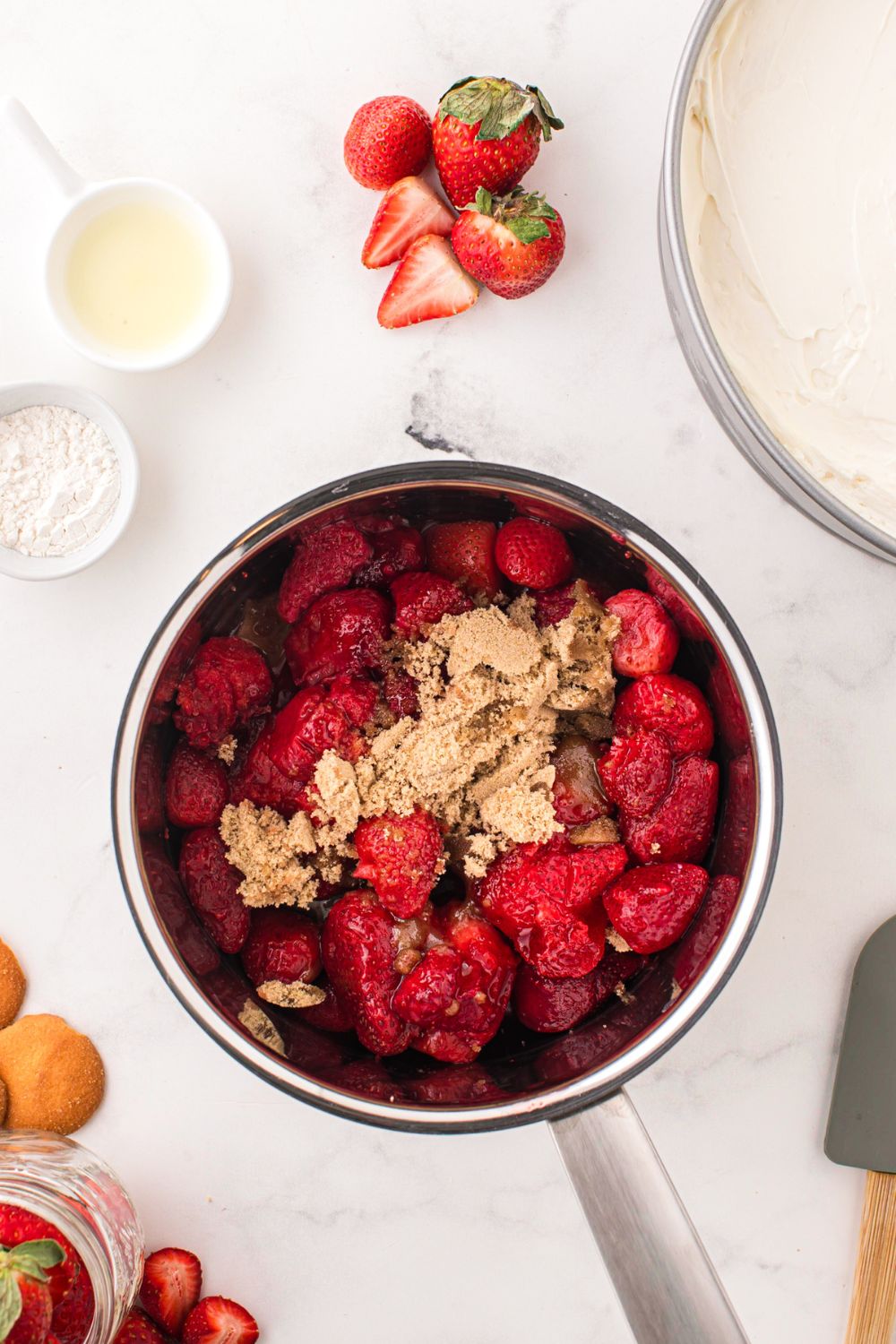 ingredients to make a strawberry glaze in pan