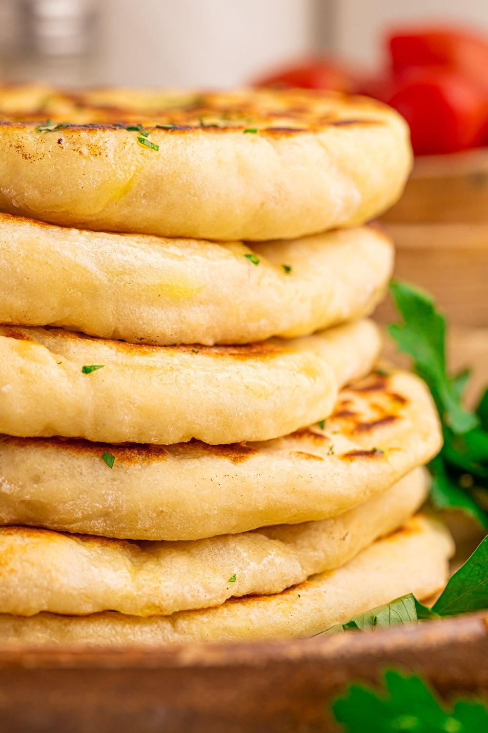 3 Ingredient Flatbread stacked on top of each other, to show how thick and fluffy they are