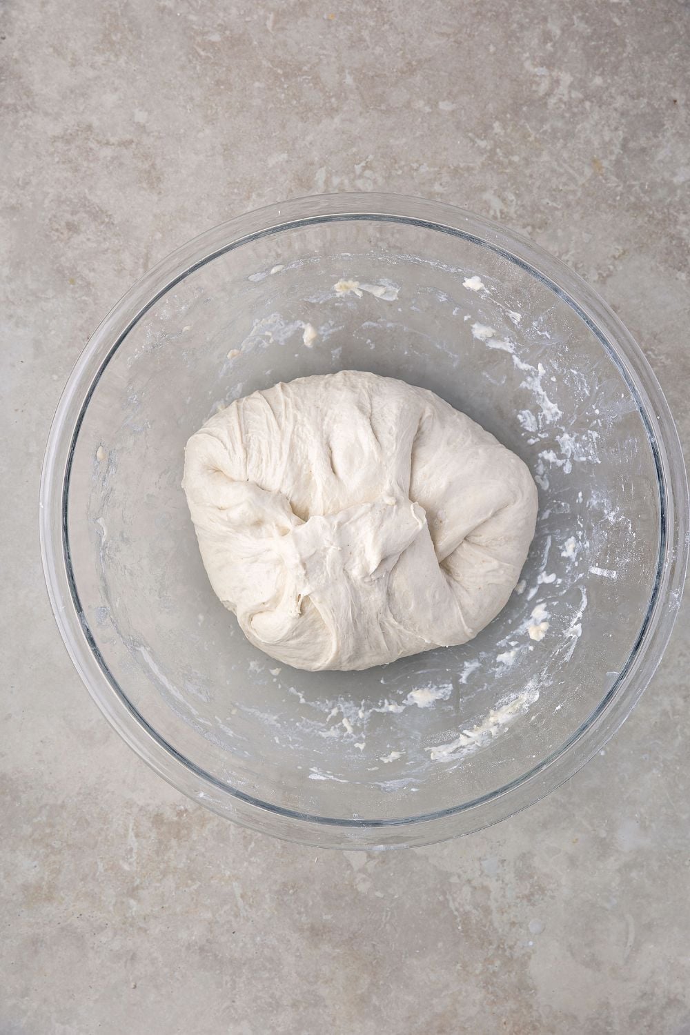 small dough ball for Homemade Sourdough Bread in a bowl on table