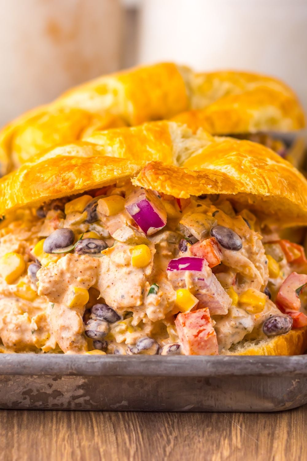 close up of Creamy Taco Chicken Salad sandwiches on tray