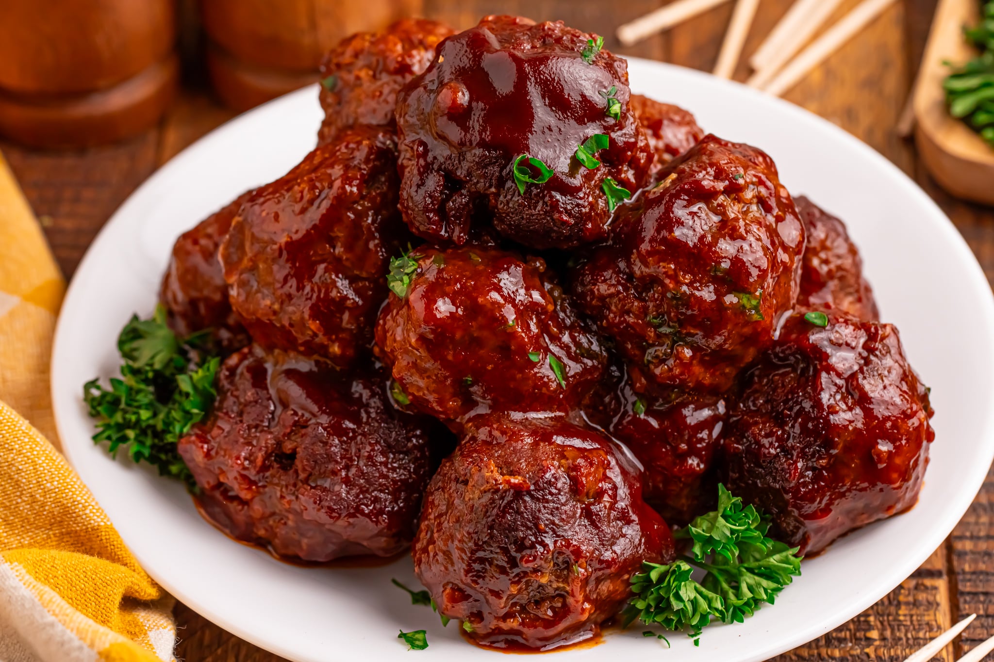 Crockpot Homemade BBQ Meatballs piled on a white plate