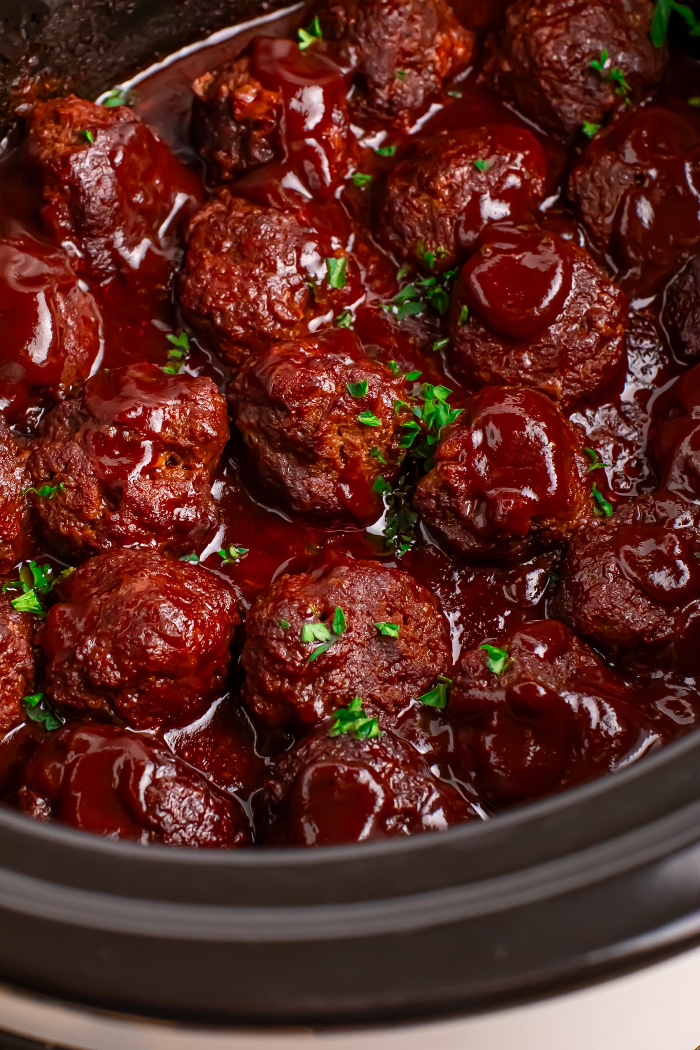 Crockpot Homemade BBQ Meatballs in a black slow cooker