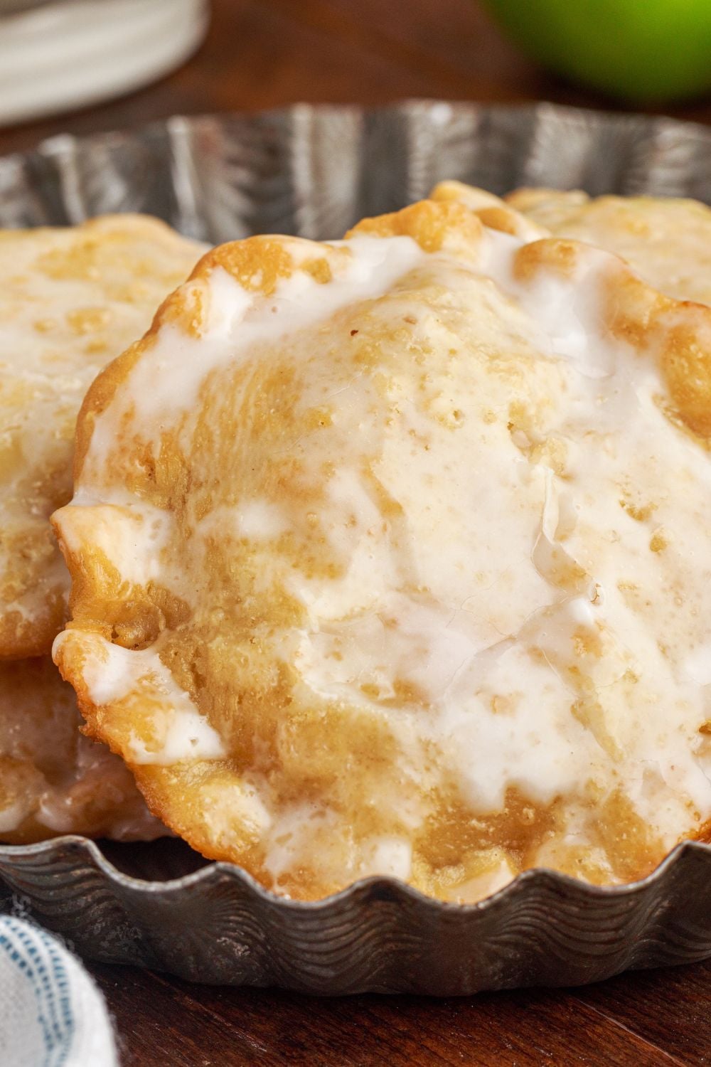 Deep Fried Apple Hand Pies close up sitting on table