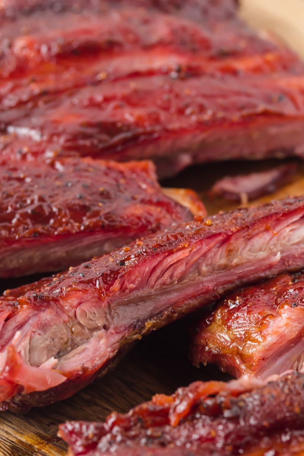 Grilled BBQ Baby Back Ribs cut into strips and placed on tables