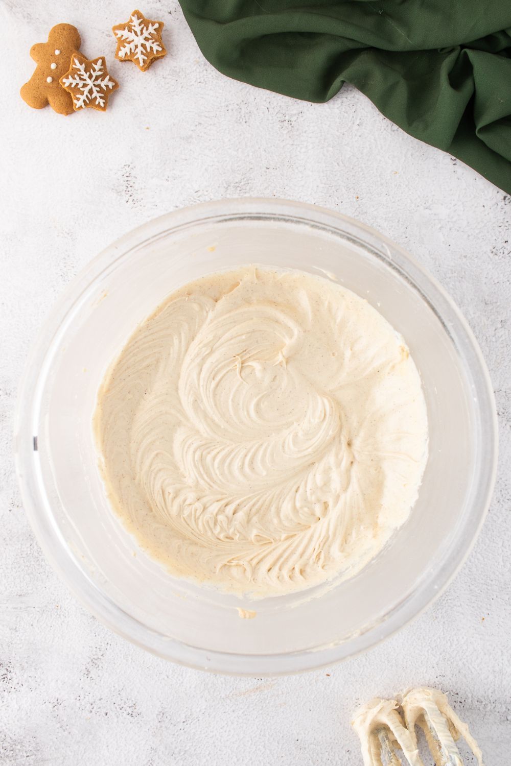 glass bowl of whipped cream cheese frosting