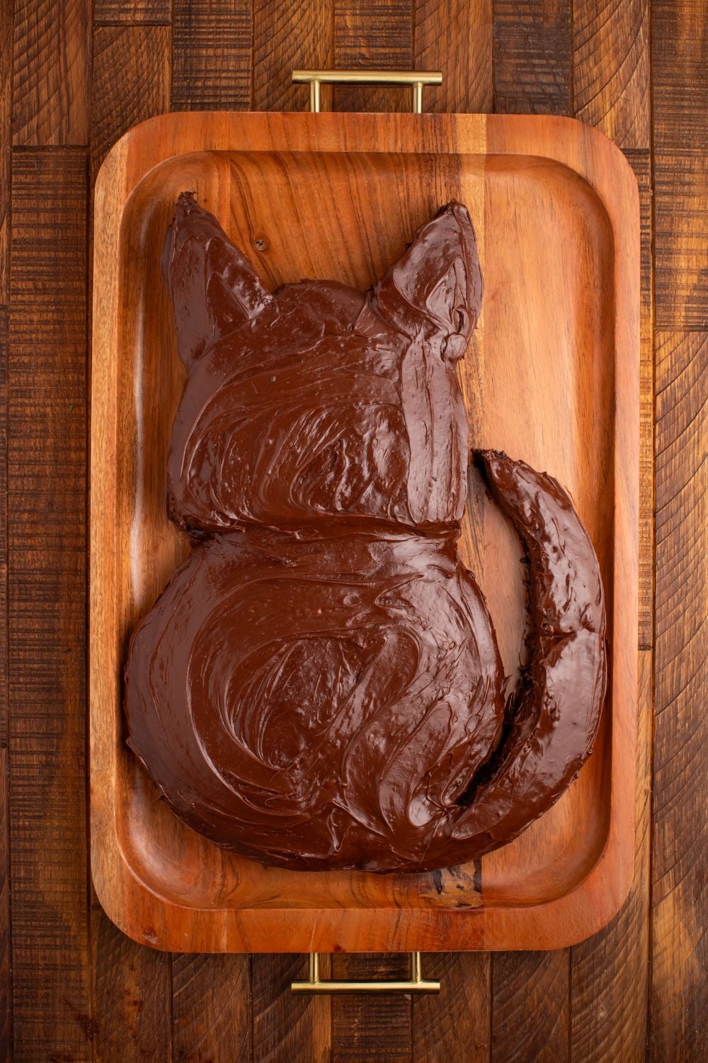 chocolate frosted Easy Halloween Black Cat Cut Out Cake that isn't decorated 