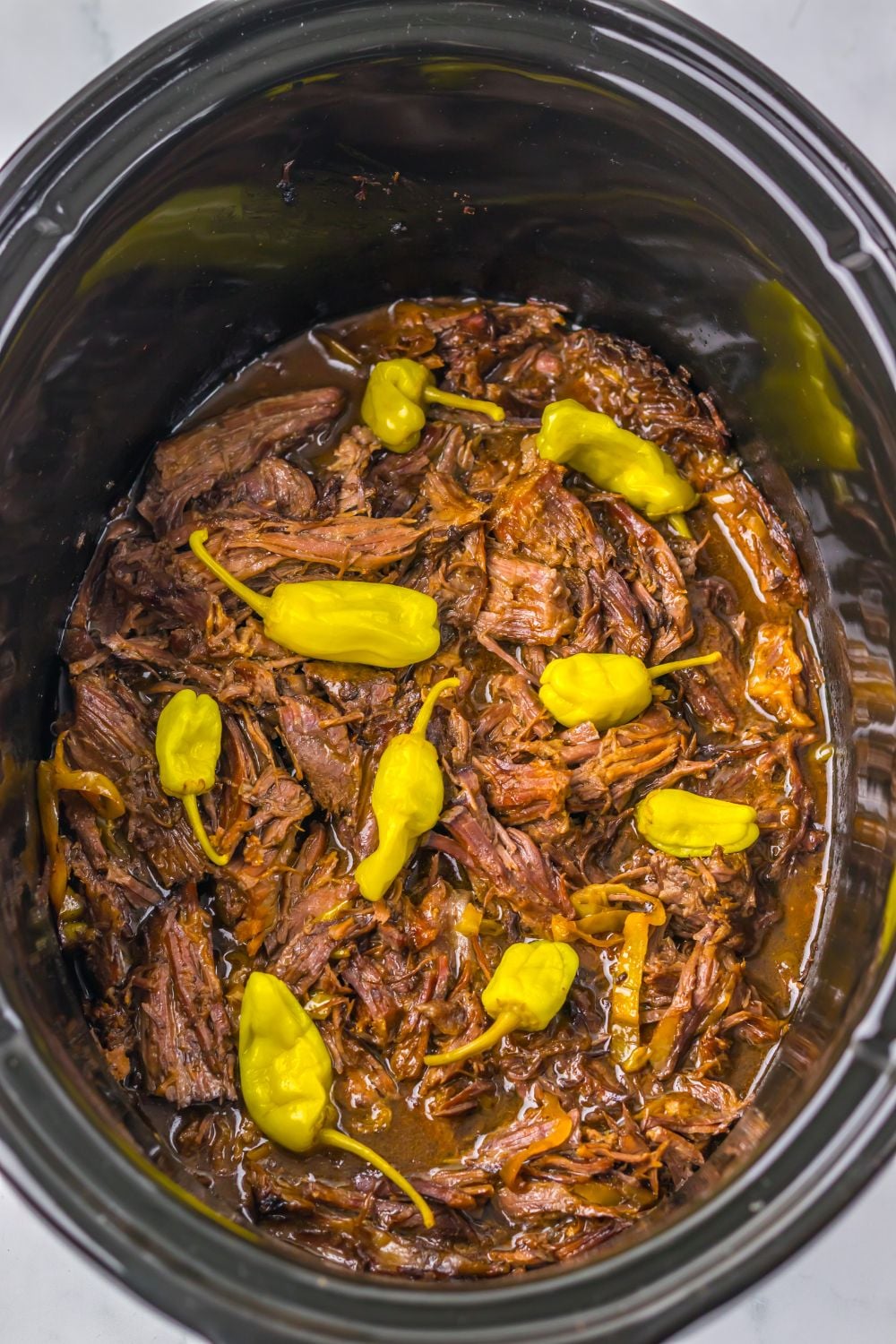 overhead look of Slow Cooker Mississippi Pot Roast in the pan 