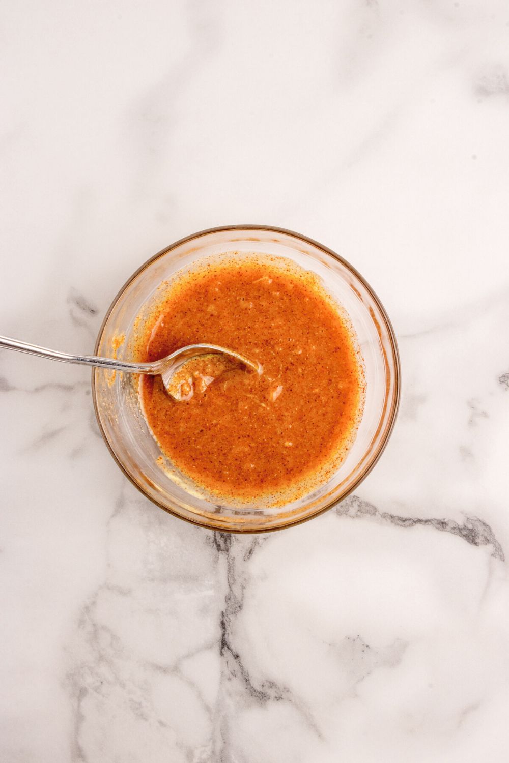sauce for making Grilled Honey Mustard Salmon in a glass bowl