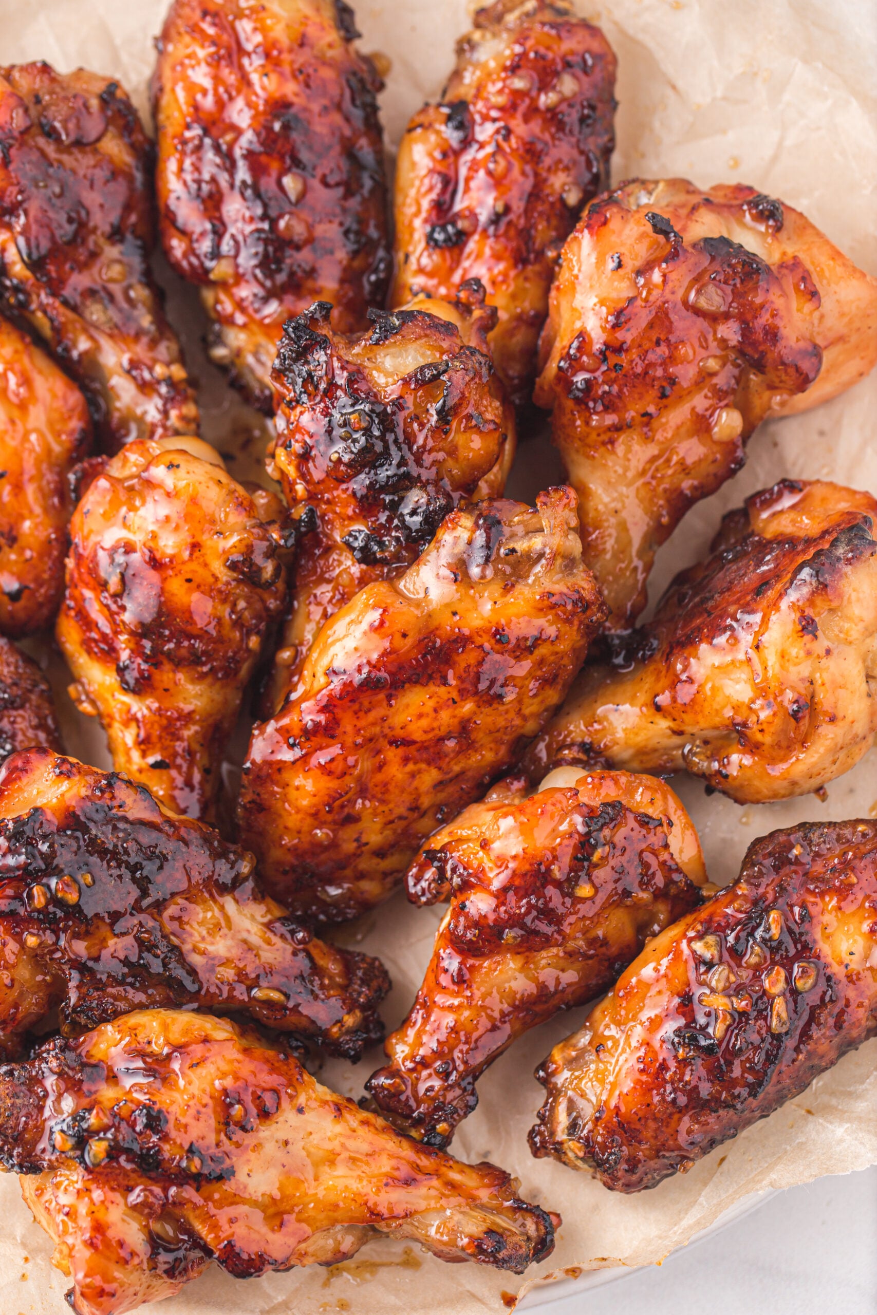Air Fryer Honey Garlic Chicken Wings on a plate up close