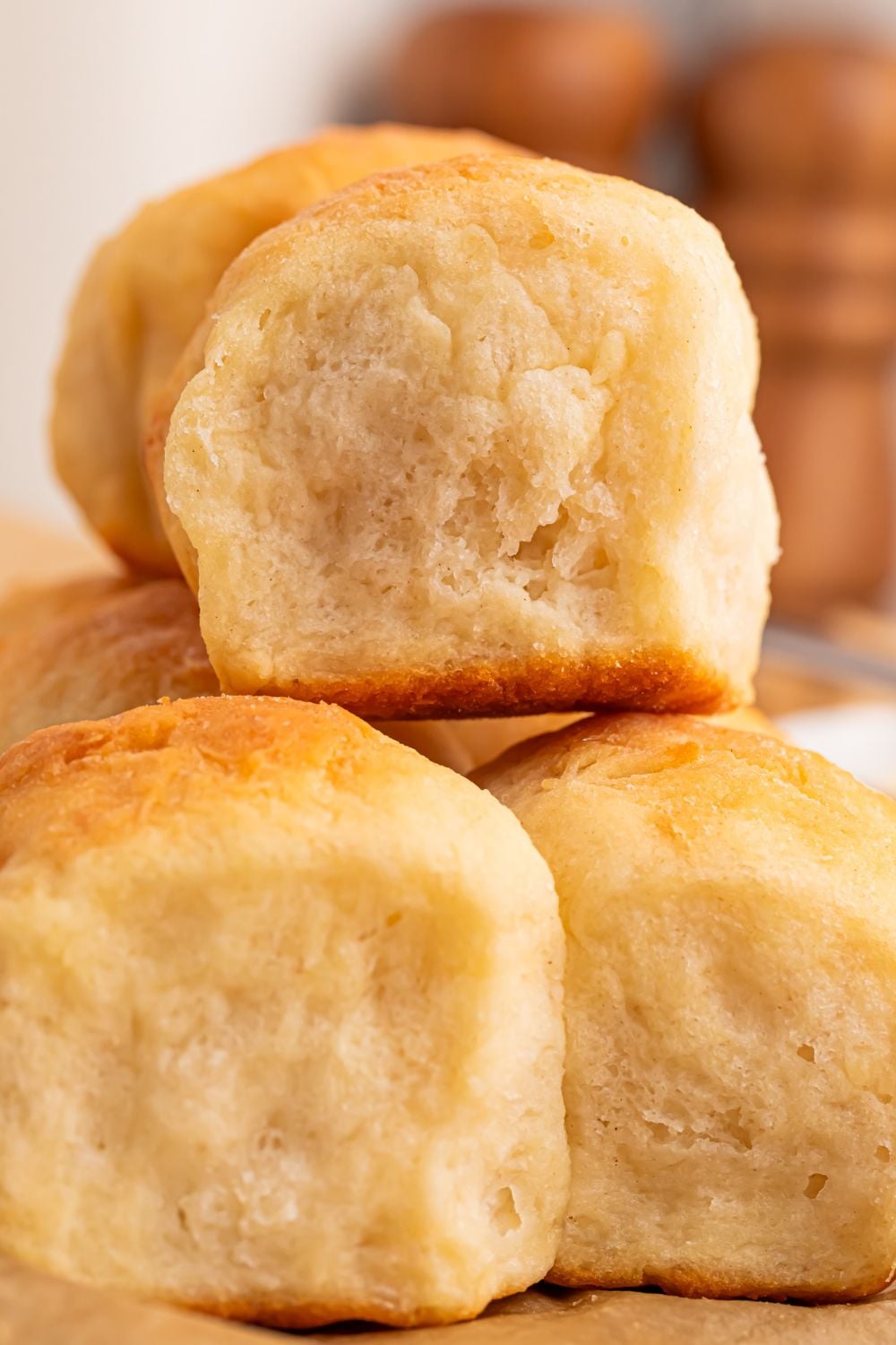 2 Ingredient Dinner Rolls stacked on table to show how fluffy they are