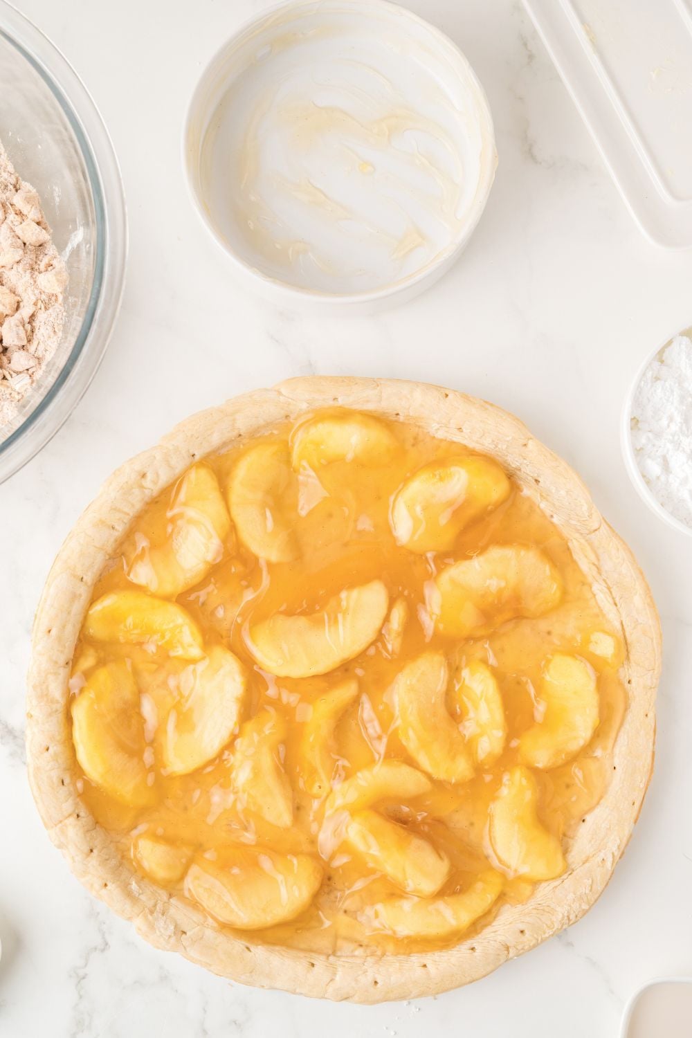 pizza crust spread with apple pie filling