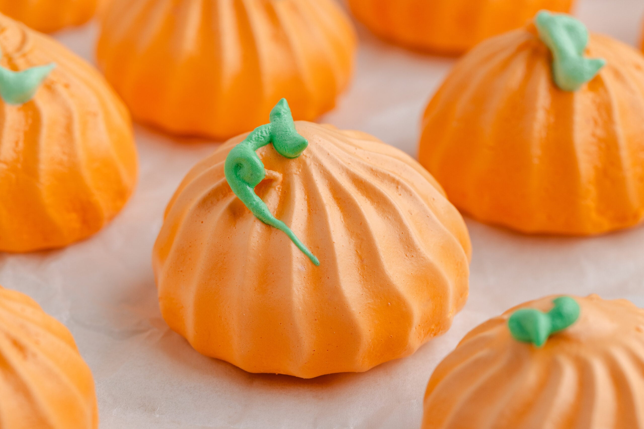 Pumpkin Meringue cookies on a table up close 