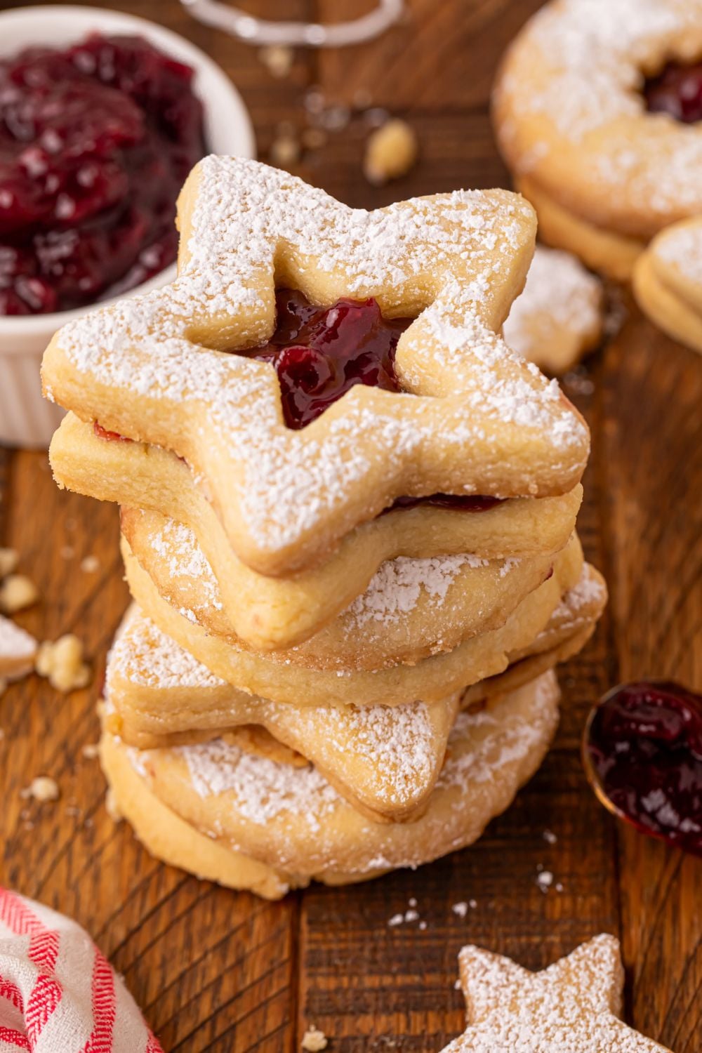 looking down on a plate with a stack of Linzer cookies