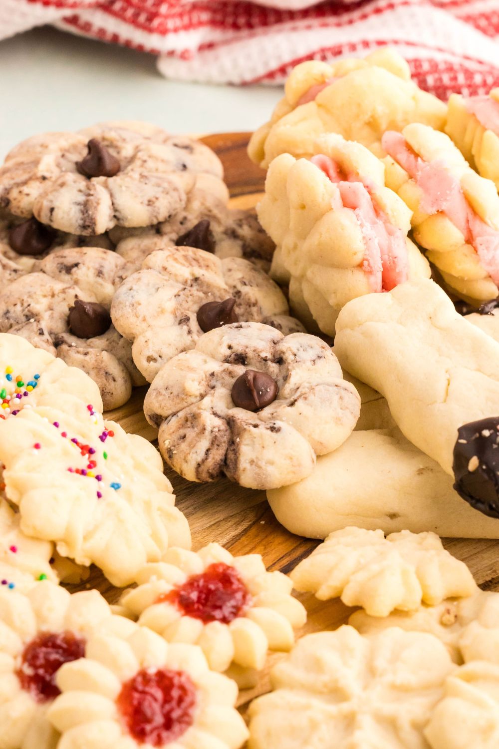 Spritz Christmas Cookies laid out on a platter showing all the different shapes and colors